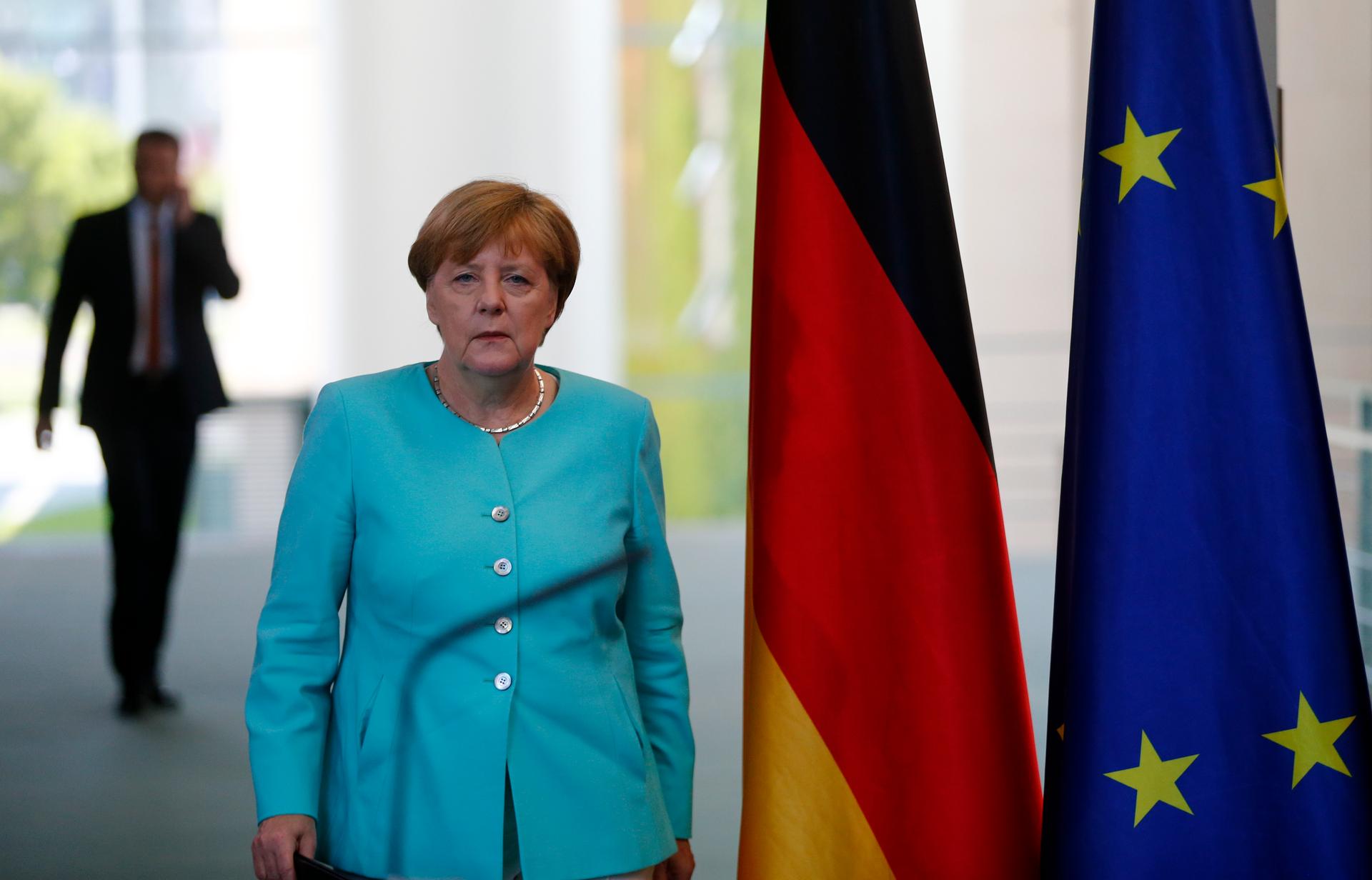 German Chancellor Angela Merkel arrives for a statement in Berlin after Britain voted to leave the European Union.