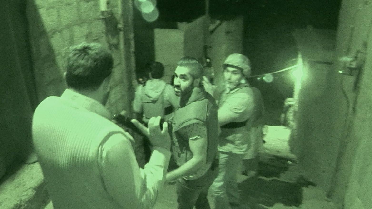Senior Superintendent Ijaz prepares for a night raid on a suspected Taliban kidnapping cell. The Pakistani Taliban have 'top-sliced' organised crime gangs across the city. 