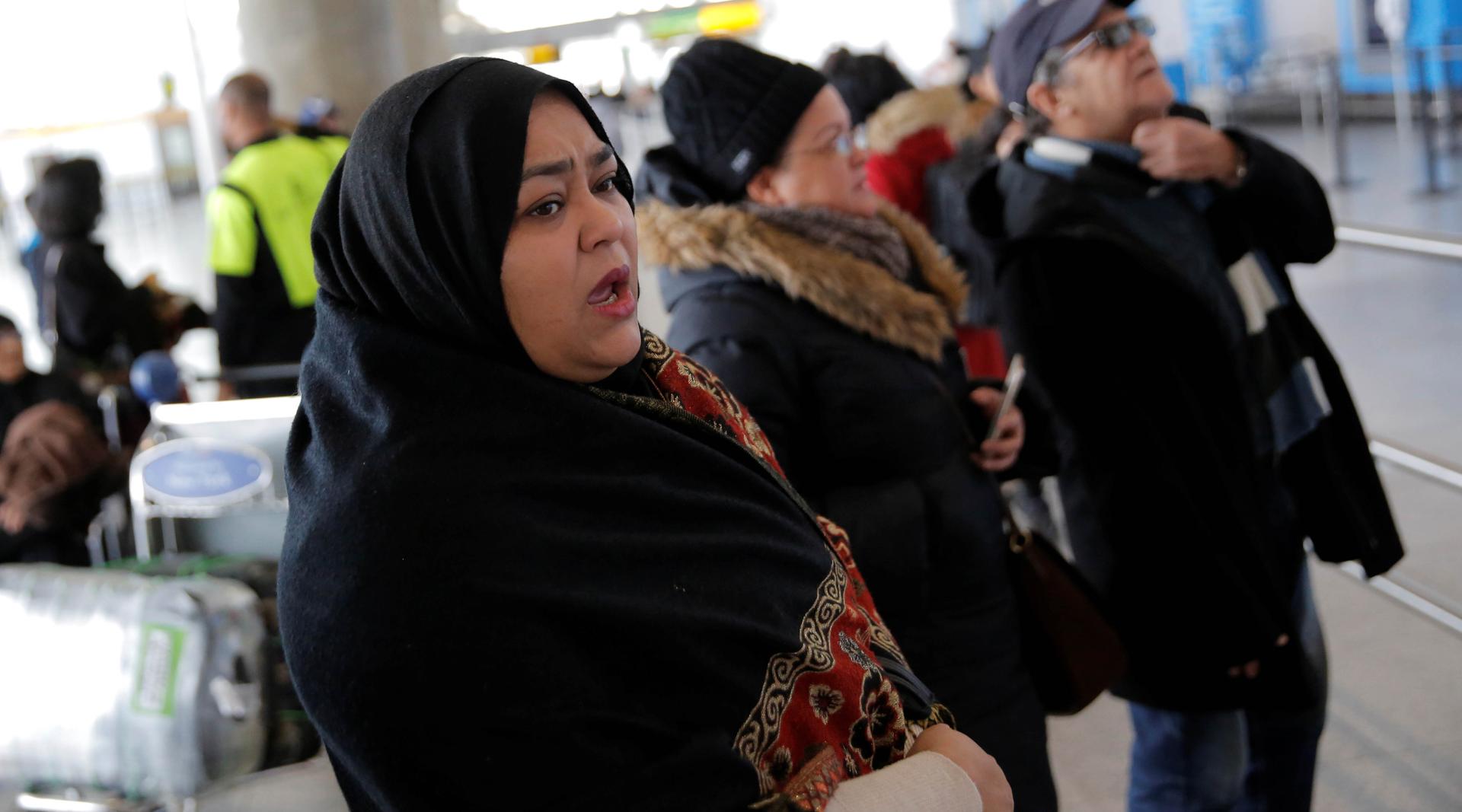 A woman waits for family to arrive at John F. Kennedy International Airport in Queens, New York, on Jan. 28.