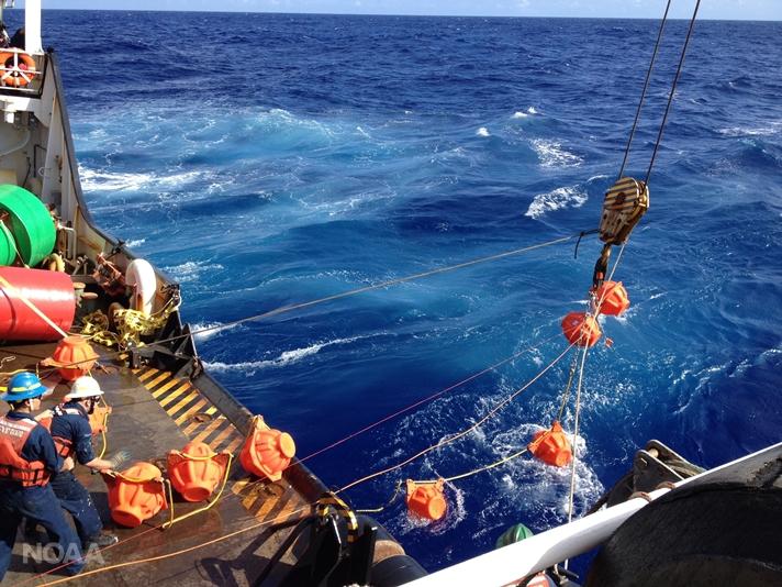 NOAA researchers haul up hydrophone