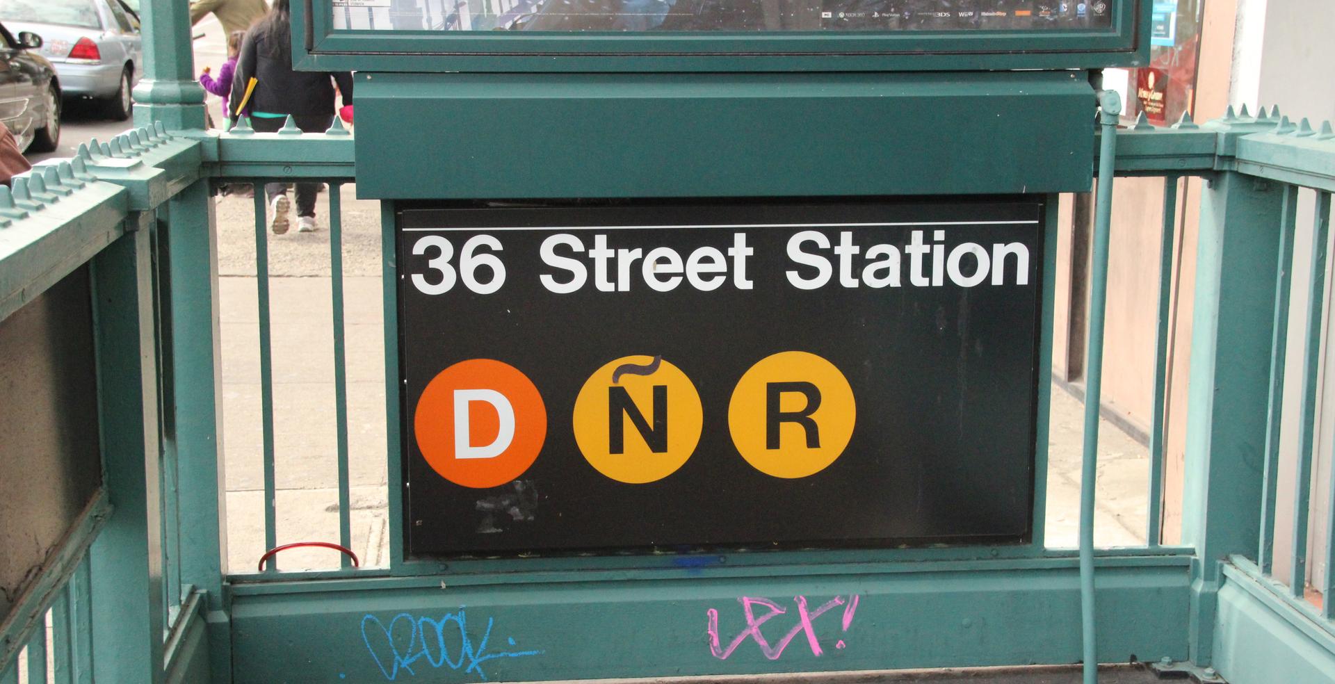 A tilde added to the sign for the N subway line in Sunset Park, a heavily Hispanic neighborhood in Brooklyn, New York.