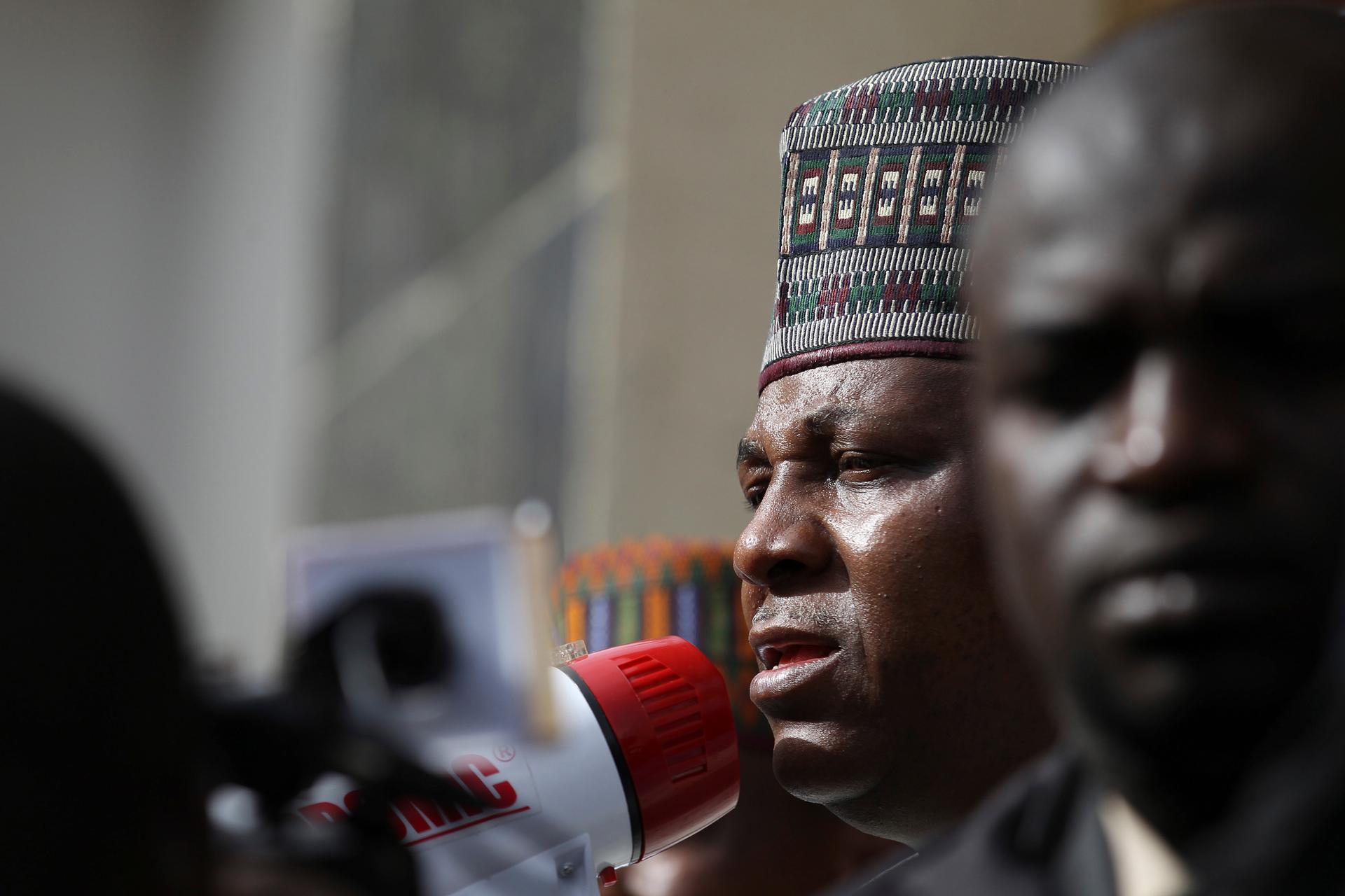 Kashim Shettima, the Governor of Borno state in northeast Nigeria, addresses a protest rally by Nigerians demanding the release of the school girls abducted from the remote village of Chibok. U.S. surveillance aircraft are flying over remote areas of nort