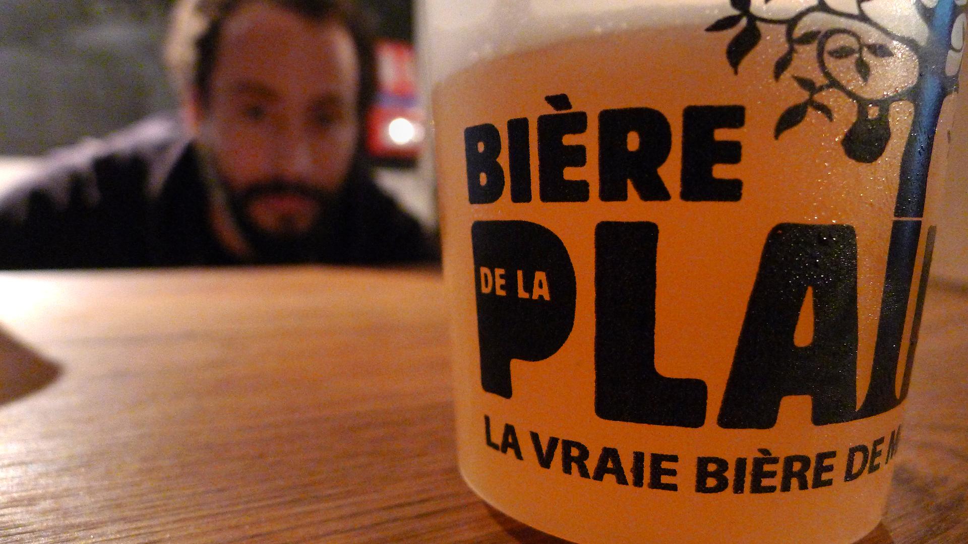 Salem Haji, co-owner of one of the few microbreweries in France, inspects his latest blonde IPA at his brewery Biere de la Plaine in downtown Marseille.