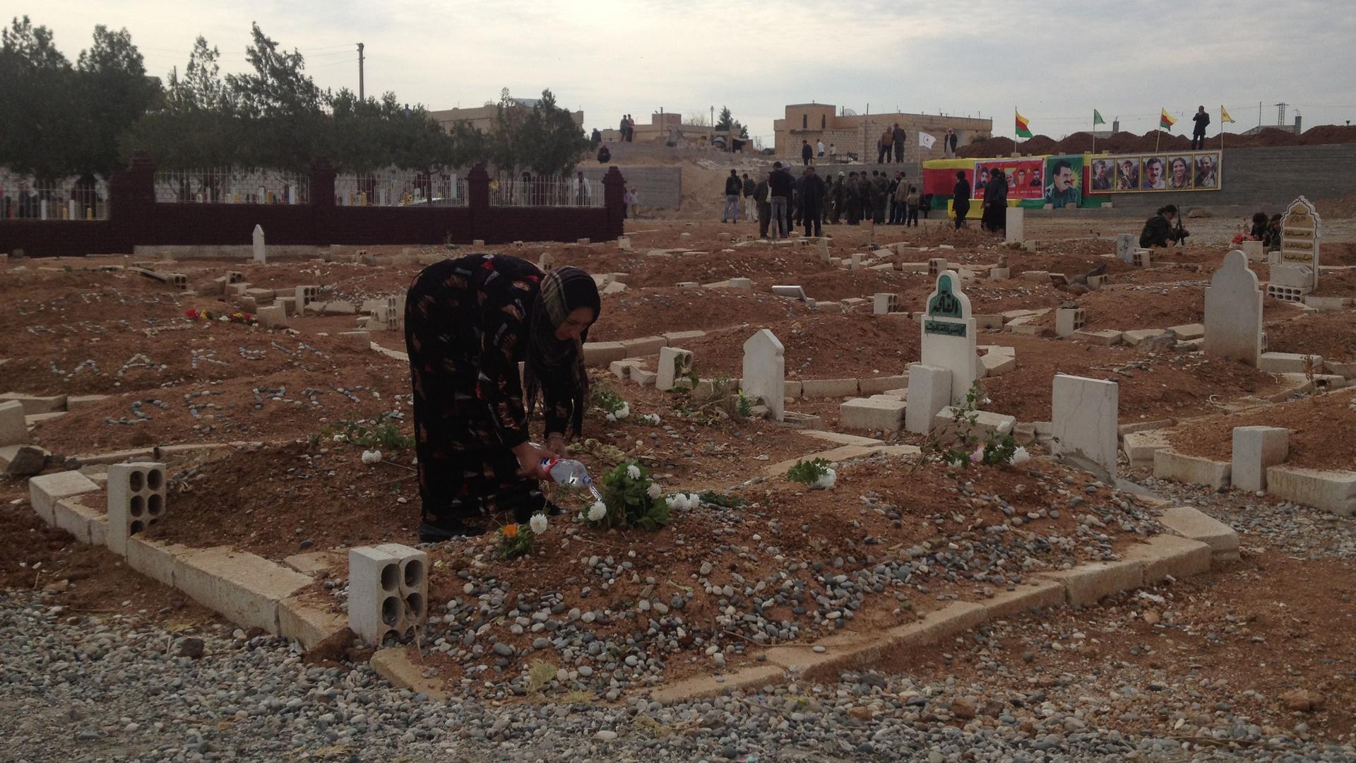 Kurds call it the "martyr cemetery." Dozens of freshly-covered graves have stretched its boundaries.
