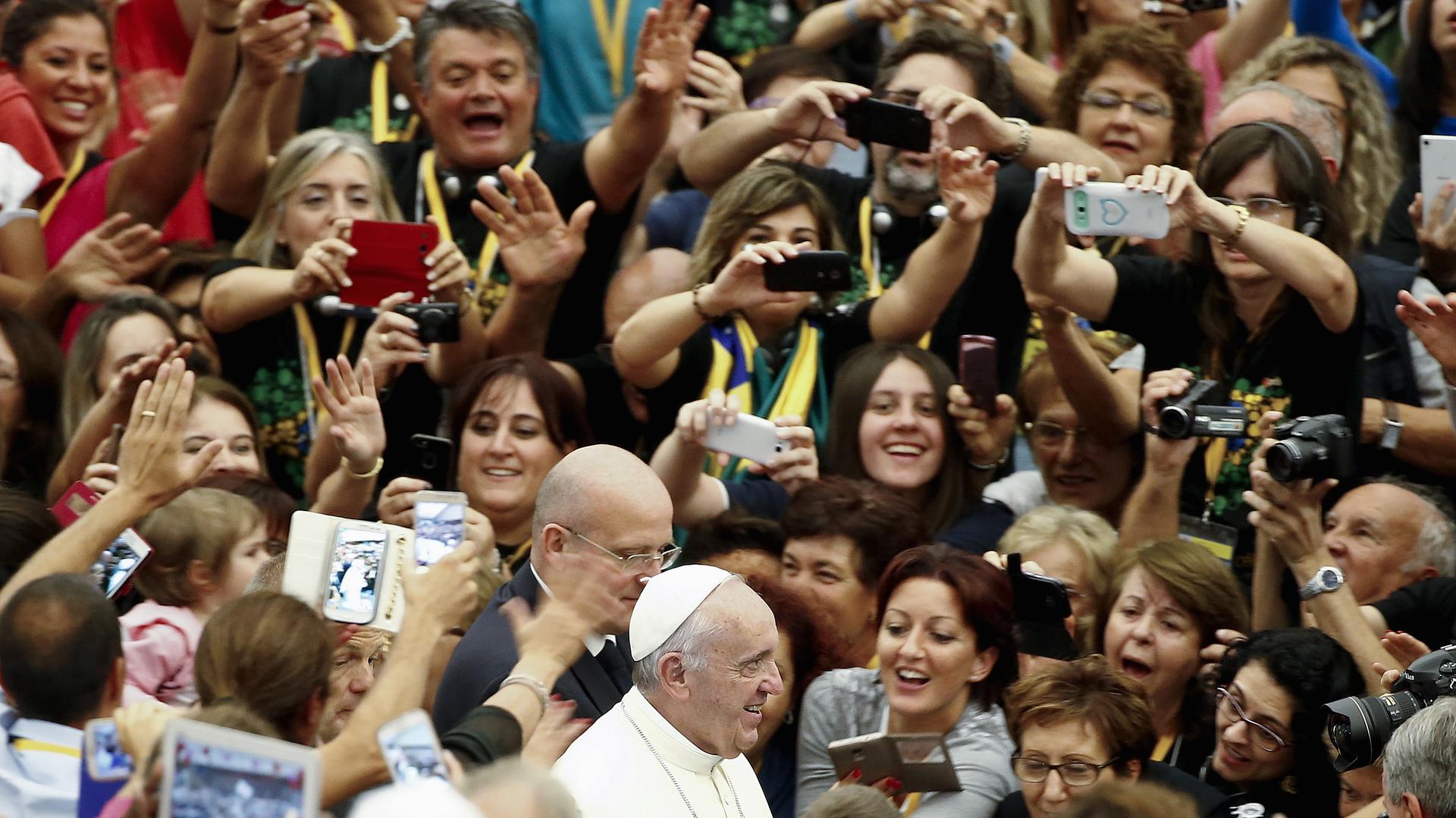 Francis greets the crowd outside of the Vatican in Rome on September 5, 2015.