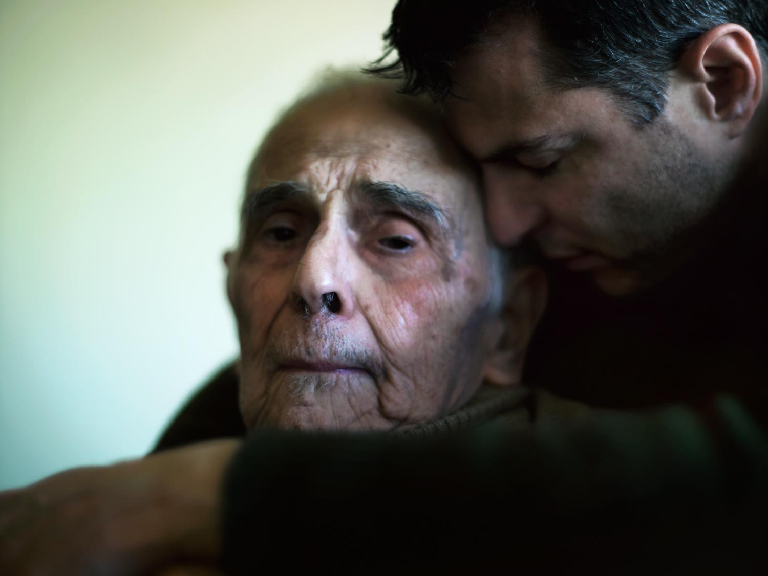 Phil Toledano hugs his father in a photo from his book, "Days With My Father."