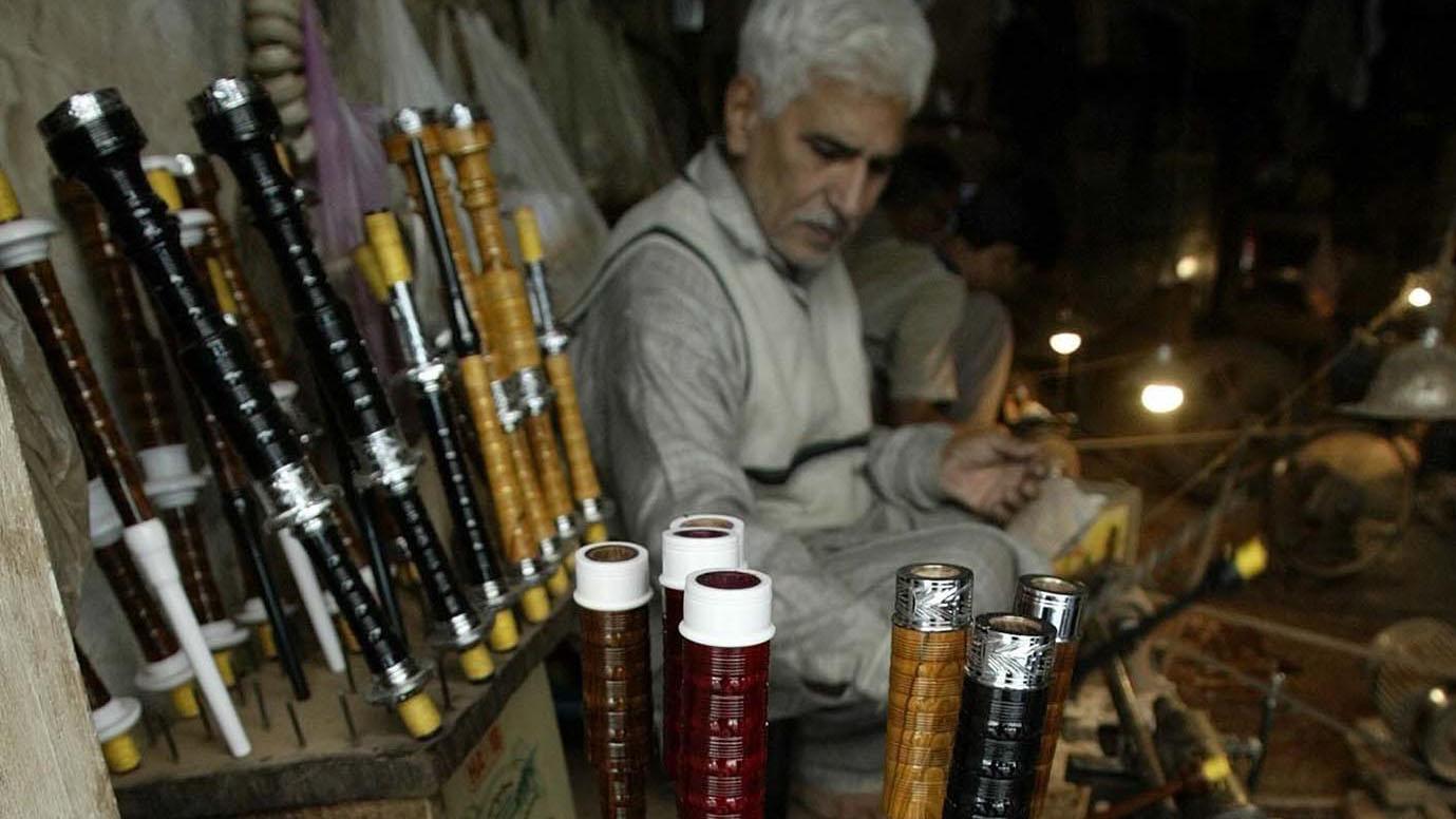 Abdul Hameed is seen busy in his workshop on Nov. 25, 2003 in Sialkot, Pakistan. This dusty city in central Pakistan is home to four generations of bagpipe makers, who once kitted out Scottish regiments in what was the British colony of India and now sell