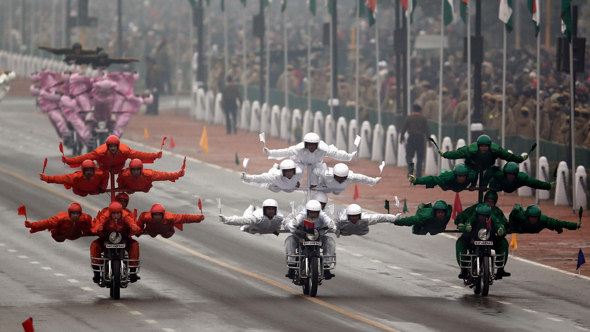 India's Border Security Force "Daredevils" motorcycle riders perform stunts as they take part during the Republic Day parade in New Delhi January 26, 2015.