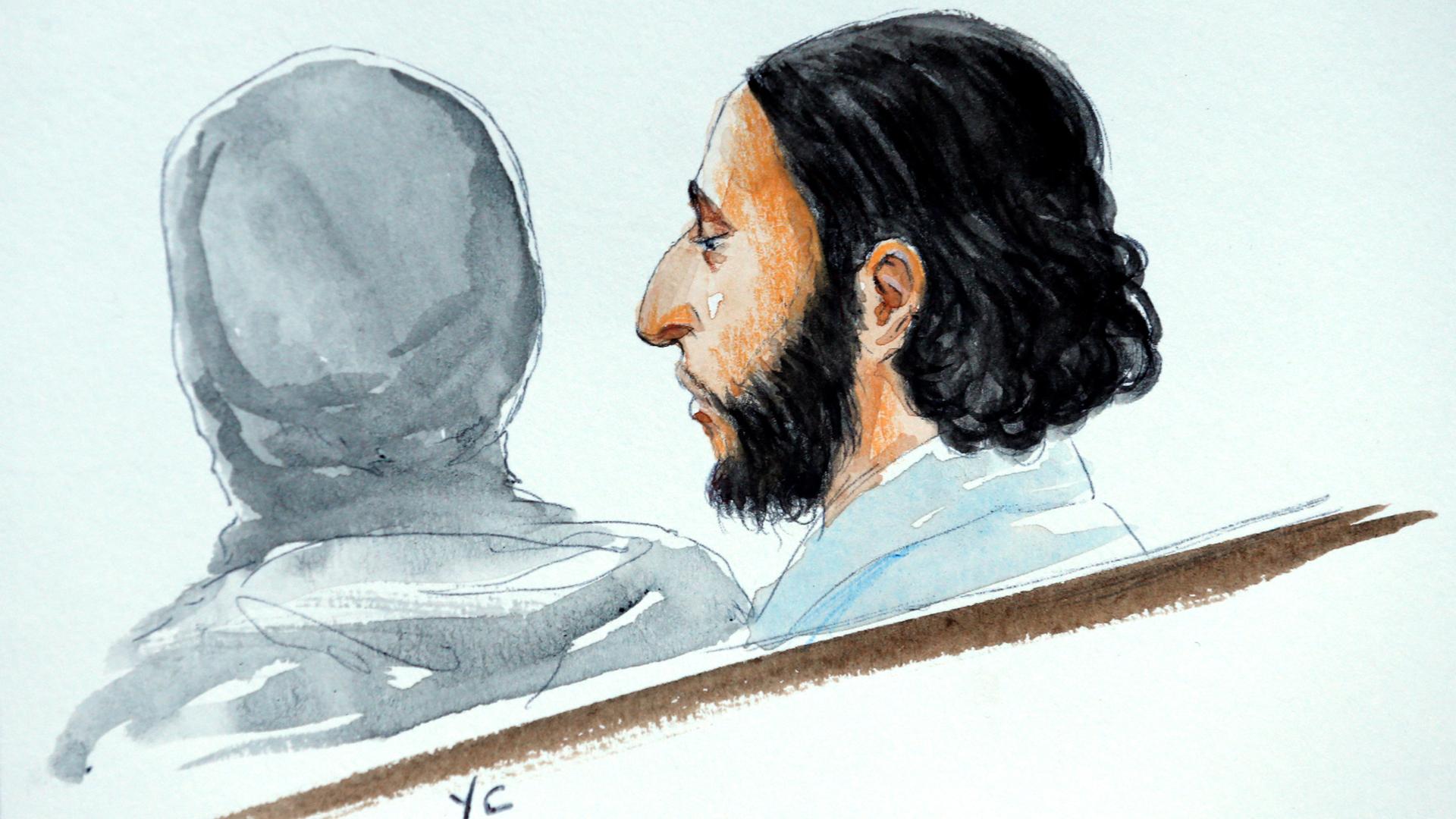 A court artist drawing shows Salah Abdeslam, one of the suspects in the 2015 ISIS attacks in Paris, in court during his trial in Brussels, Belgium.