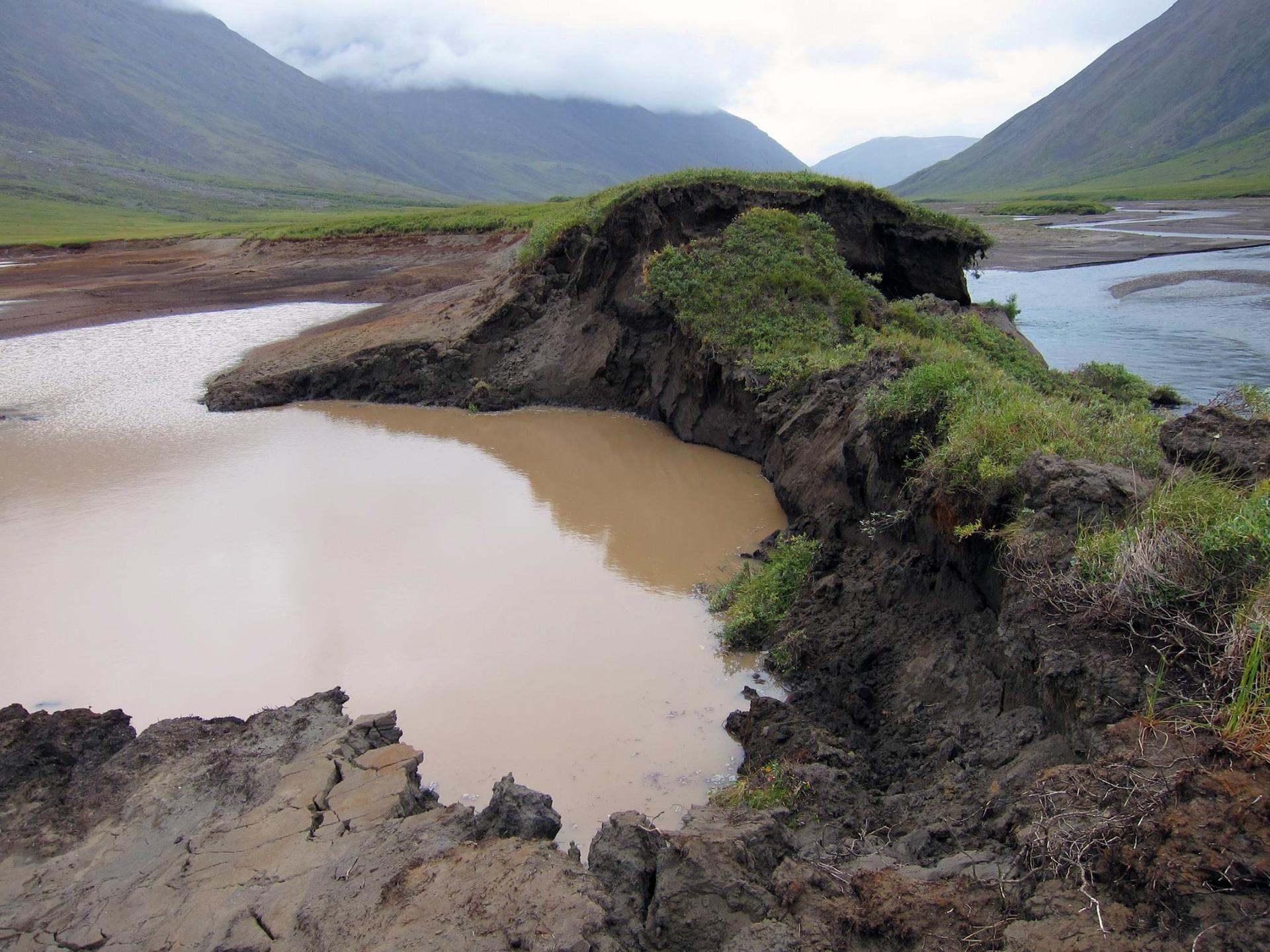 A bank of this lake thawed in the Gates of the Arctic National Park in Alaska, allowing the Okokmilaga River to cut through and drain it to sea.