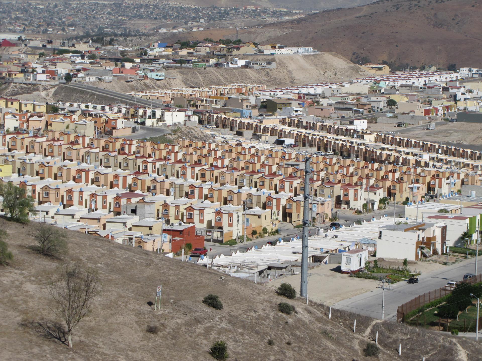 Planned housing developments continue to be built on the outskirts of Tijuana. Mexican authorities say they want to promote infill development and sustainable housing.