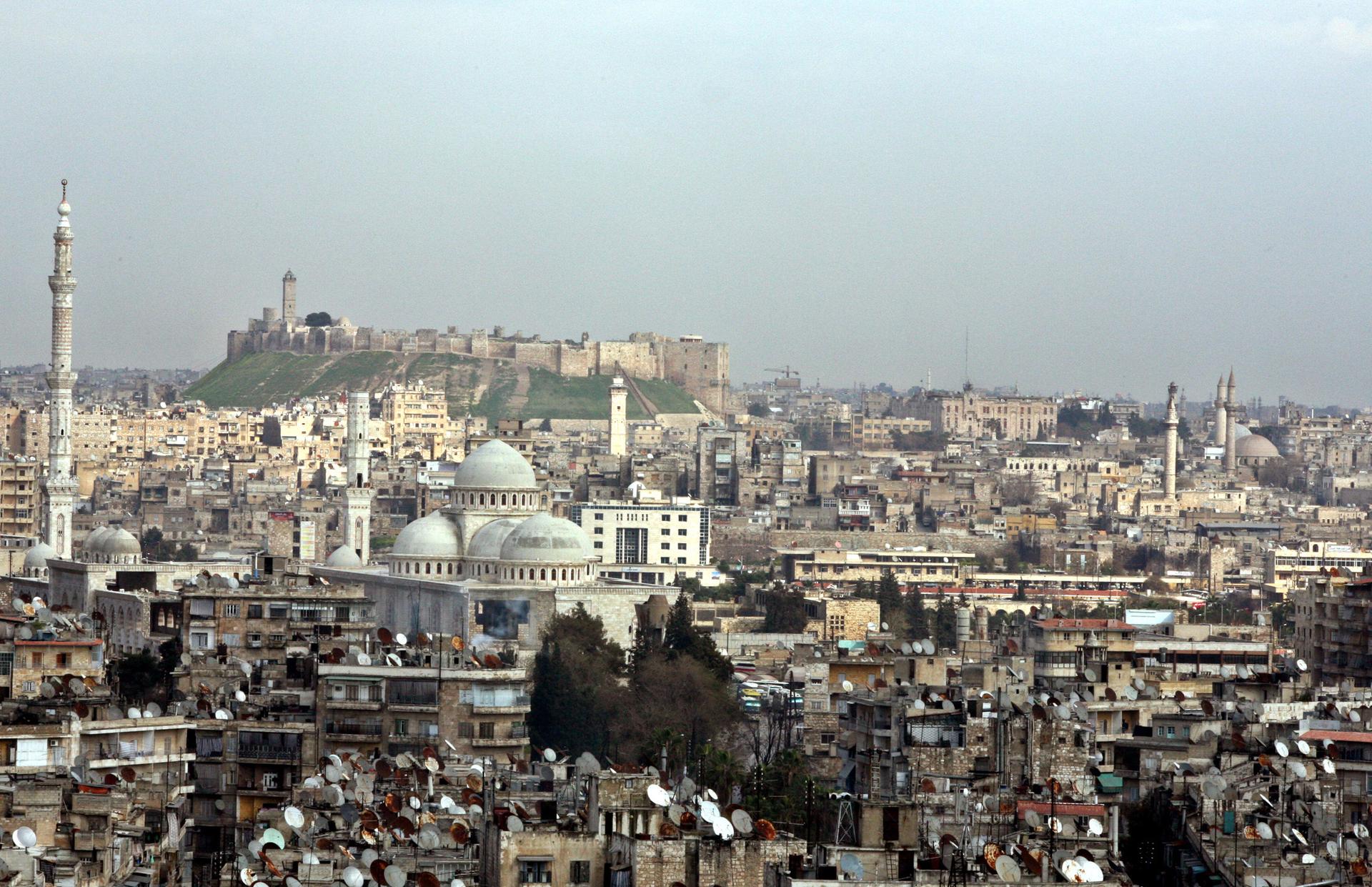 Old Aleppo, looking toward the citadel, before the war. Many of the minarets and ancient buildings have been damaged or destroyed in the civil war.