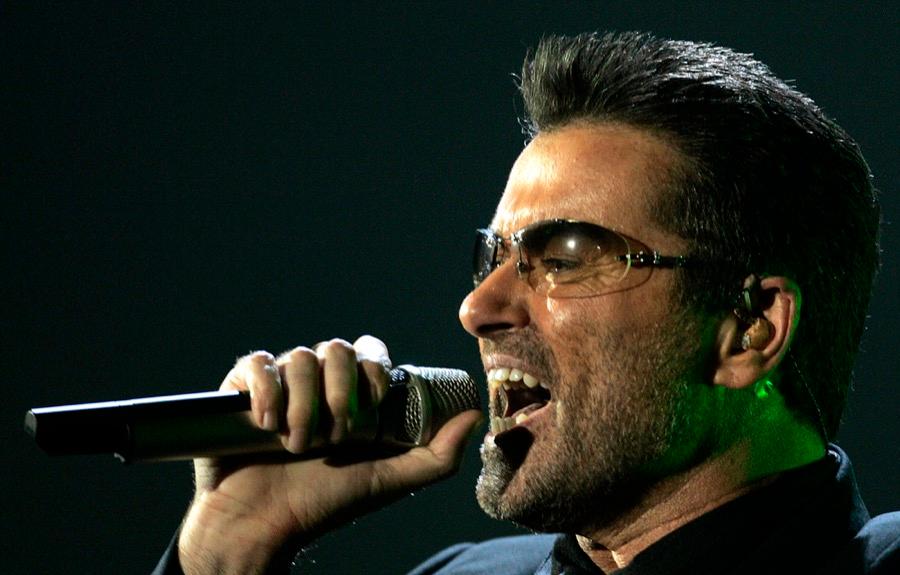 British singer George Michael performs at the MEN Arena in Manchester, northern England, Nov. 17, 2006.