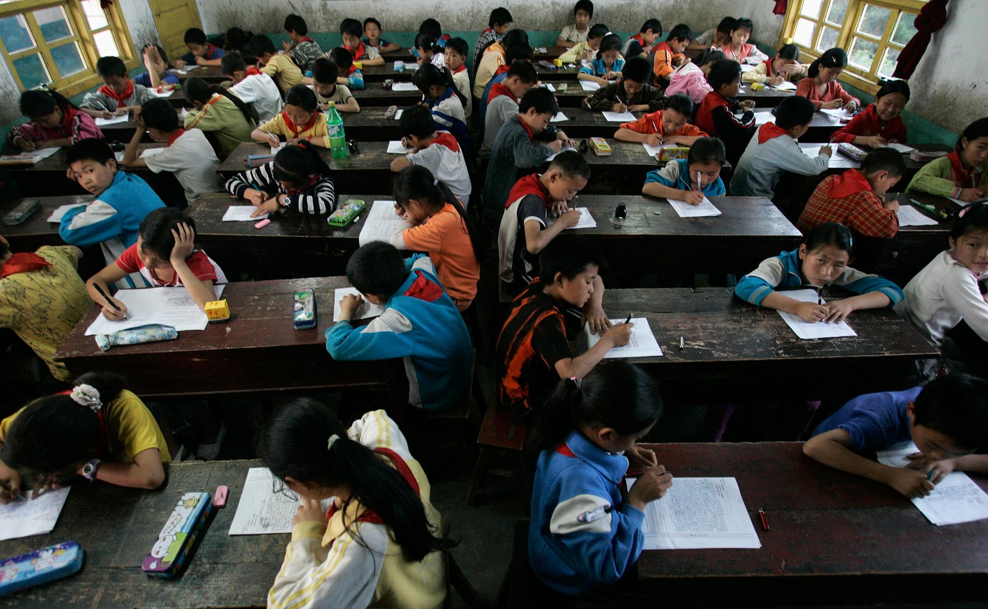 In China, the education system puts great emphasis on rote memorization. And students of all ages take lots and lots of exams. 