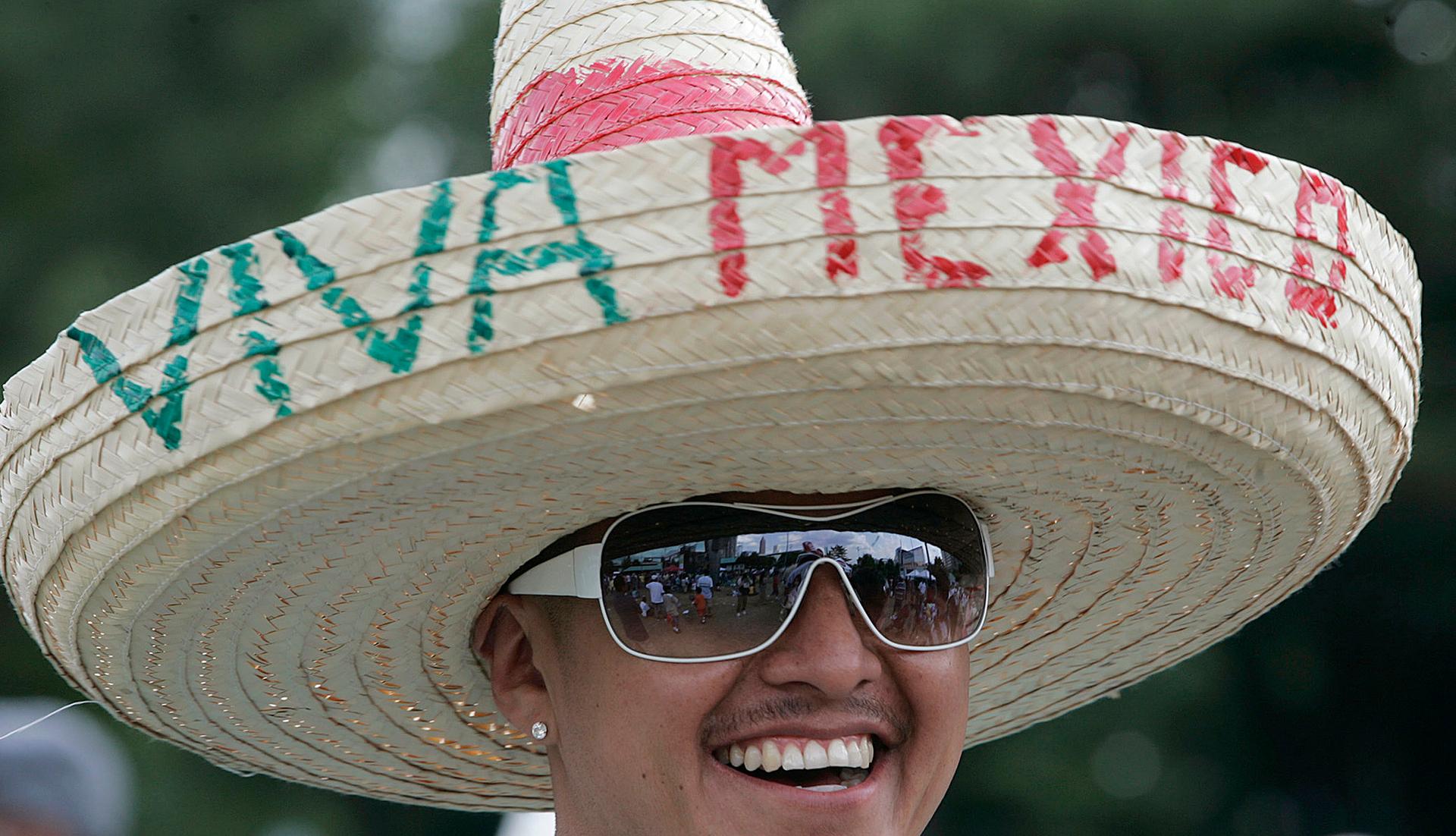 A man wears a sombrero as he listens to Latin music in celebration of Cinco de Mayo in Atlanta, Georgia.