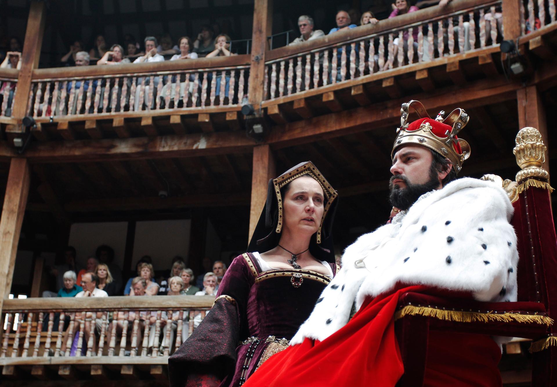Actors Dominic Rowan (R) and Kate Duchene perform as Henry VIII and Queen Katherine in Shakespeare's Henry VIII at the Globe theatre in London July 6, 2010.