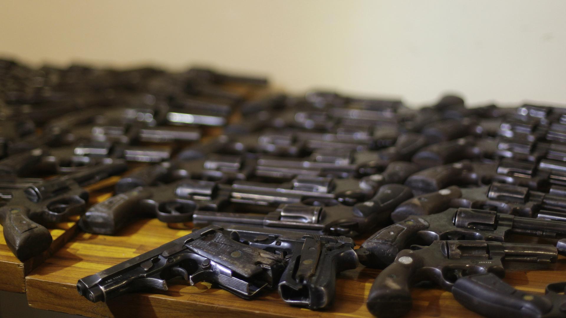 Guns delivered during a disarmament campaign are displayed in Rio de Janeiro, Brazil, May 6, 2011.