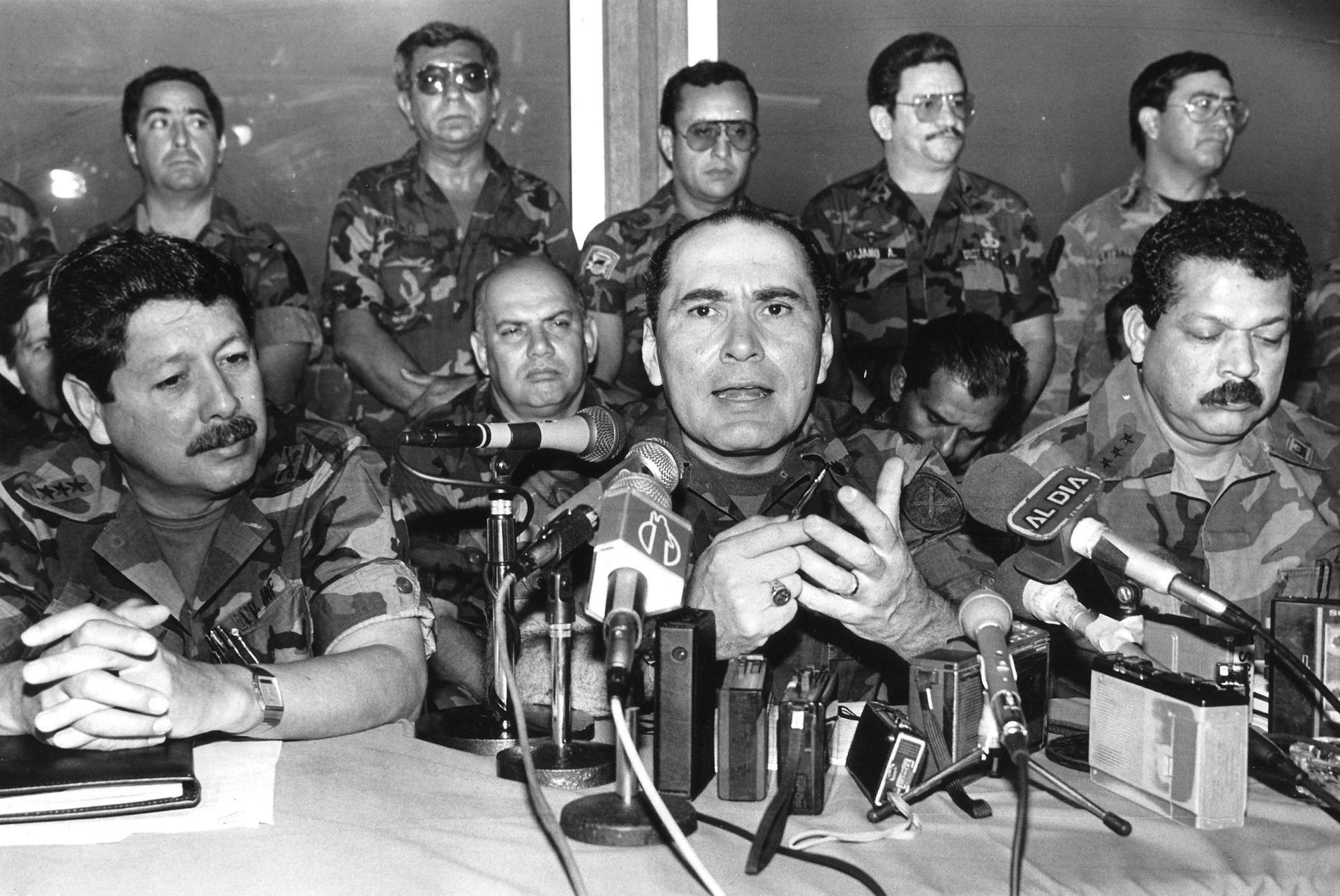 El Salvador's defense minister, General Rafael Humberto Larios, speaks during a news conference in San Salvador in a 1990 file photo. Larios and eight other former Salvadoran soldiers were arrested in 2011 for suspected involvement in the 1989 killing of 