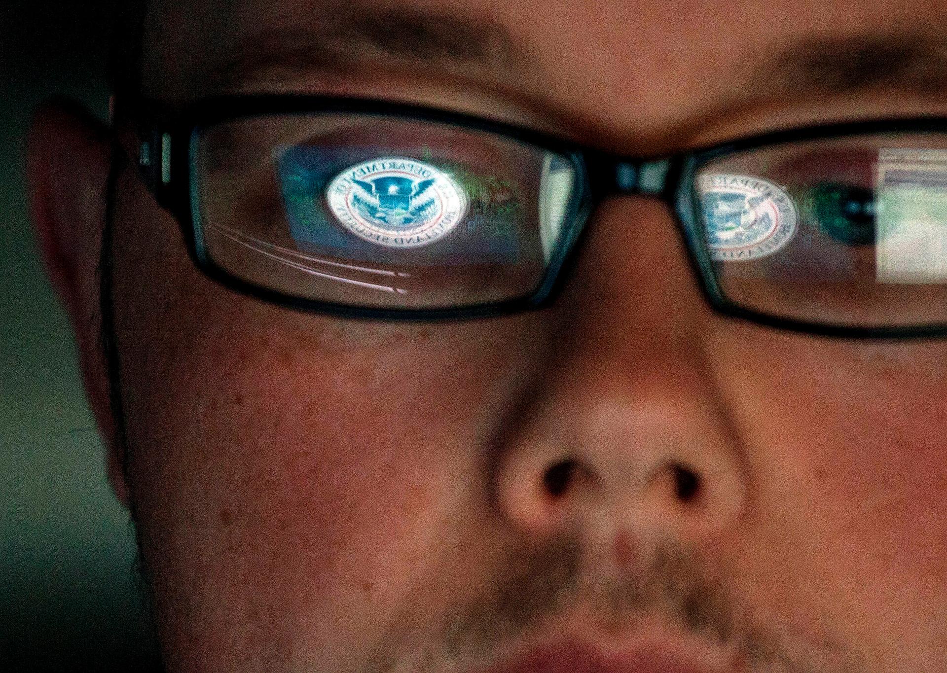 A cyber security analyst works in a watch and warning center at a Department of Homeland Security cyber security defense lab at the Idaho National Laboratory.