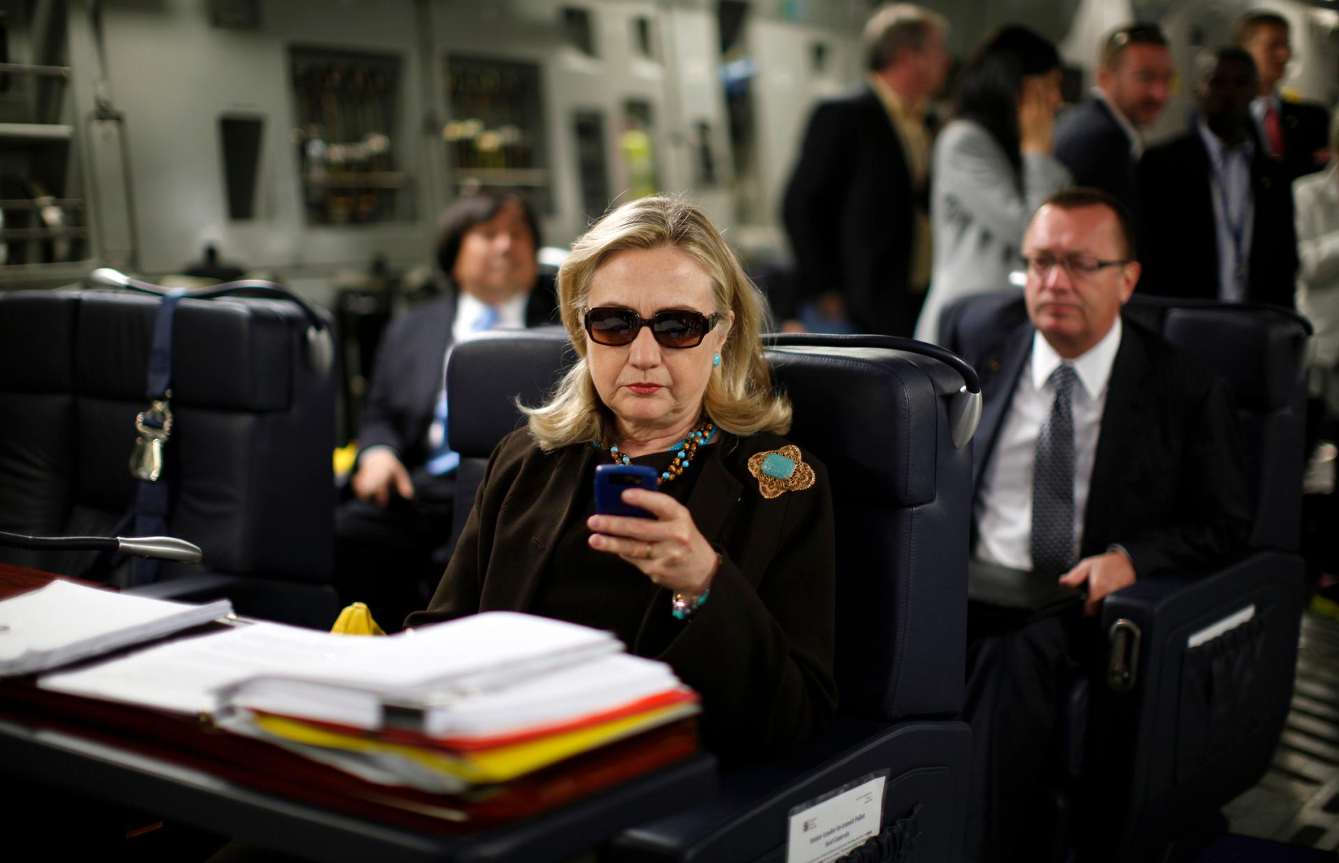Secretary of State Hillary Clinton in a C-17 military aircraft from Malta bound for Tripoli, Libya October 18, 2011.
