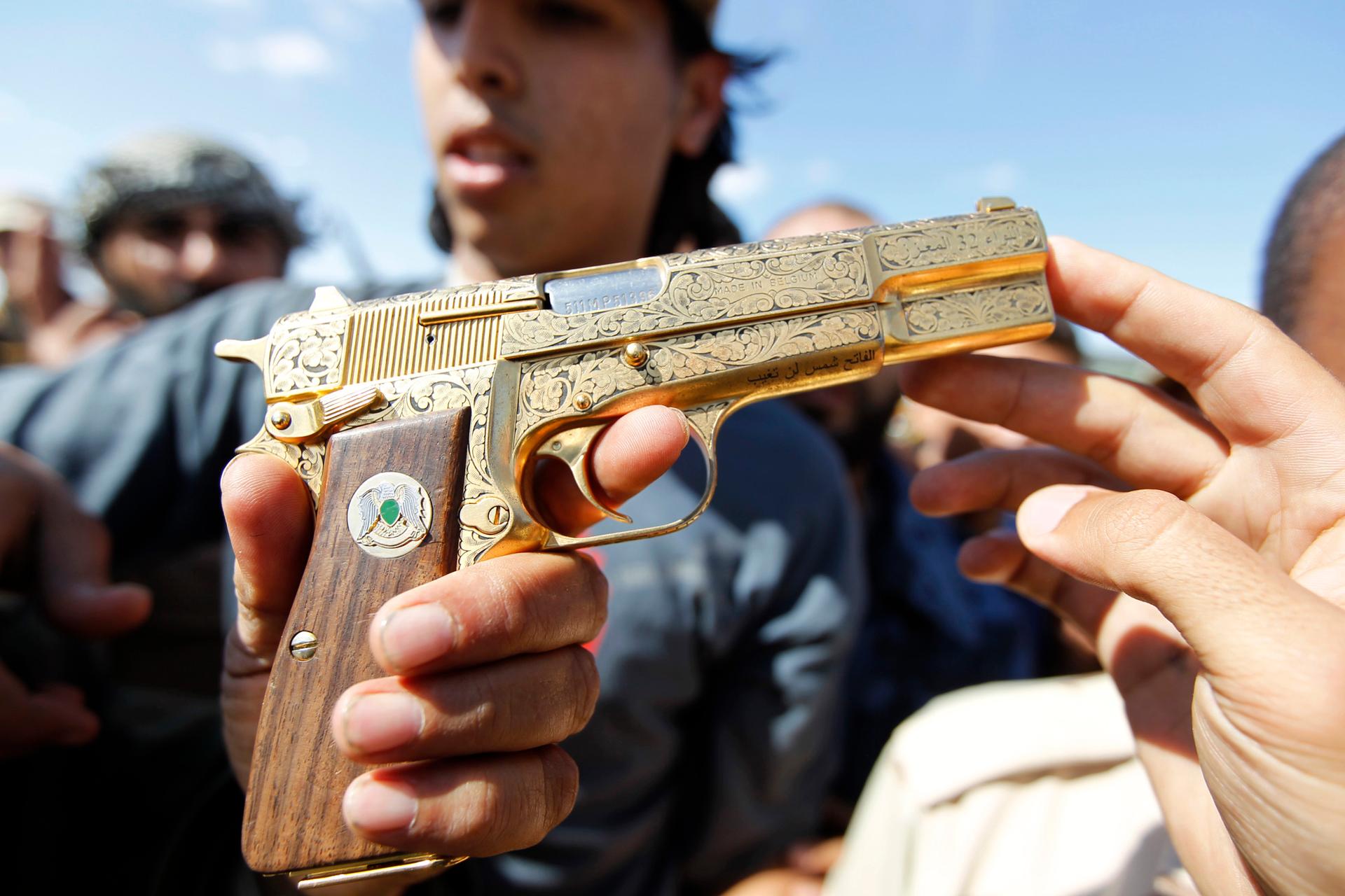 The gold plated pistol soon after it was seized by anti-Gadaffi rebels near Sirte