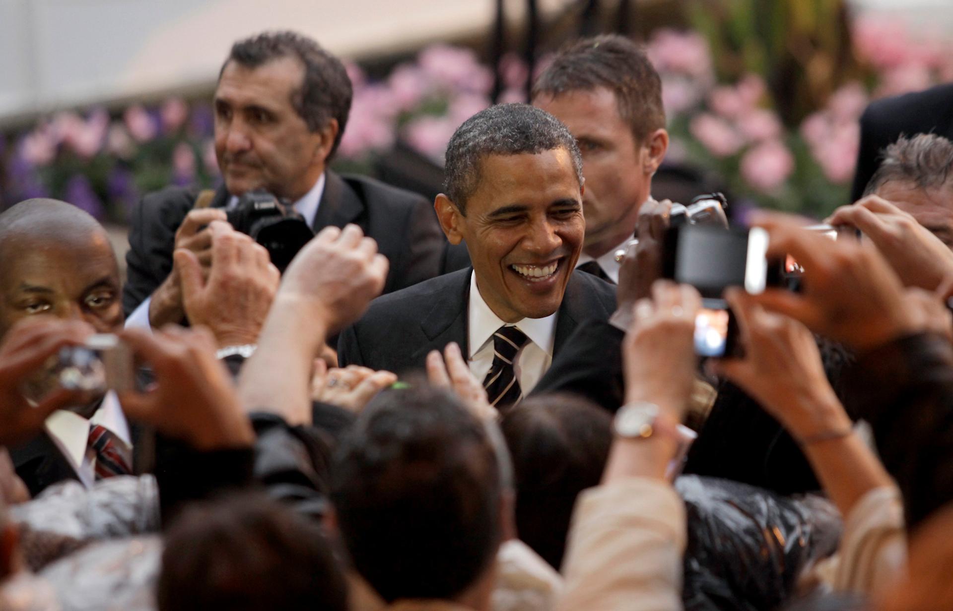 U.S. President Barack Obama greets an adoring crowd in Cannes, France on November 4, 2011.