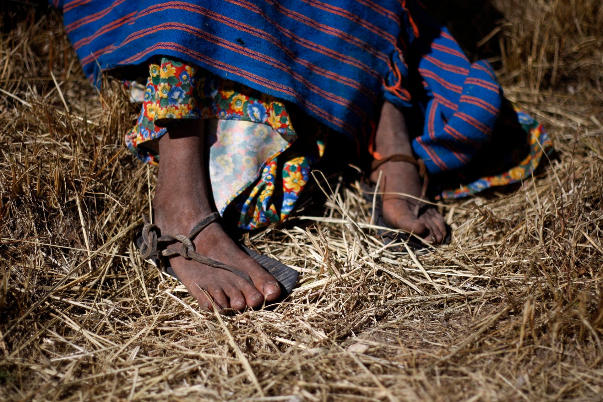 The feet of a Tarahumara girl are seen in Guachochi November 30, 2011.