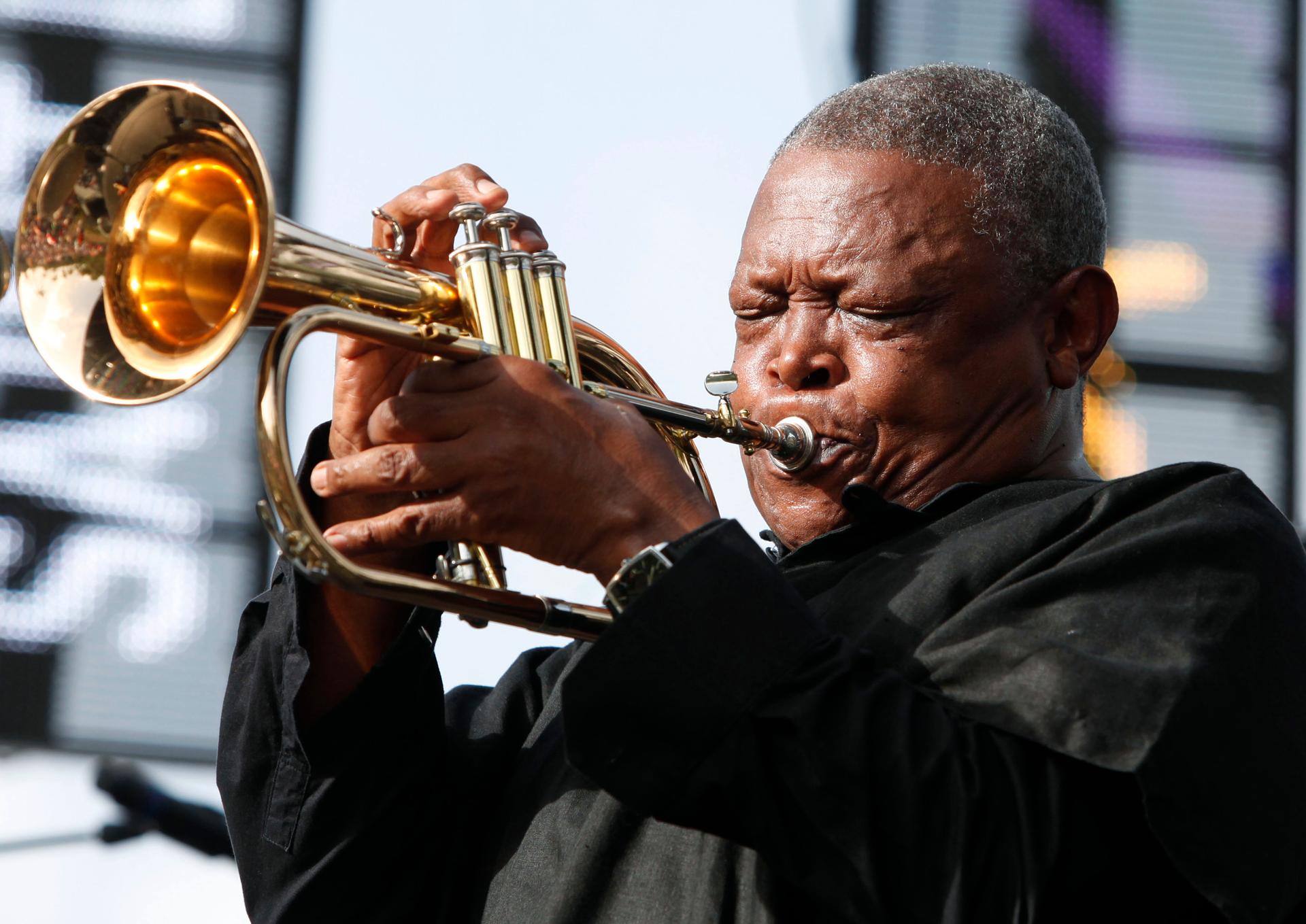 South African trumpeter and musician Hugh Masekela performs on May 13, 2012. 