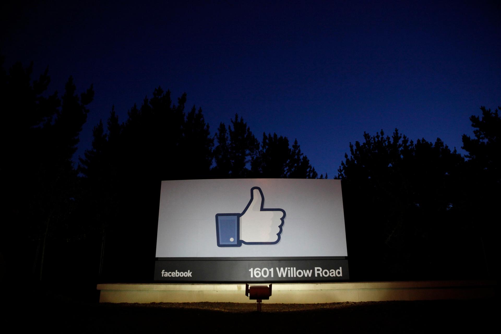 The sun rises behind the entrance sign to Facebook headquarters in Menlo Park before the company's IPO launch, May 18, 2012. Facebook Inc, will begin trading on the Nasdaq market on Friday, with it's initial public offering at $38 per share, valuing the w