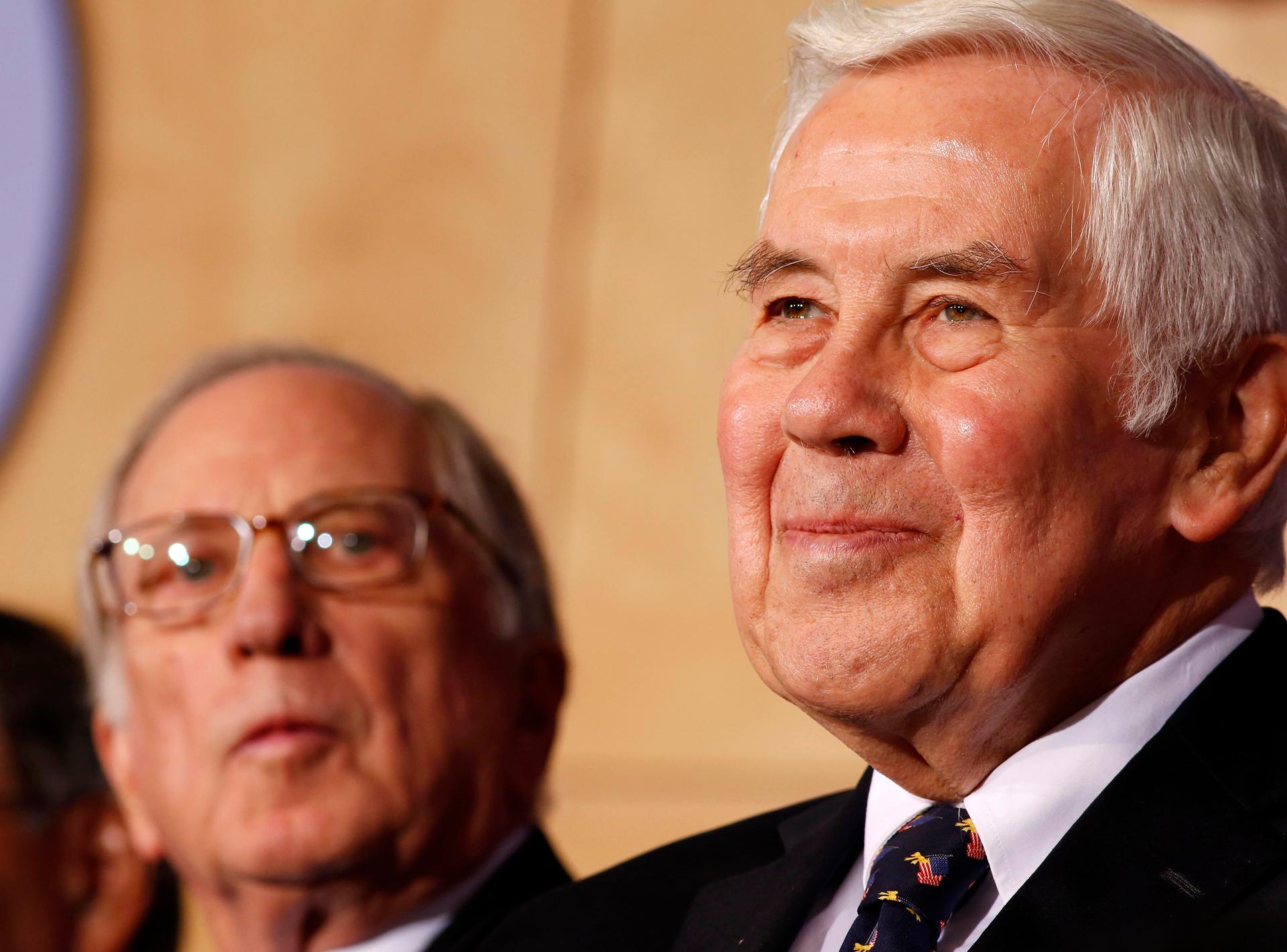 U.S. Senator Richard Lugar (R) joins Co-chairman and chief executive officer of the Nuclear Threat Initiative, Sam Nunn at the National Defense University in Washington, on December 3, 2012.