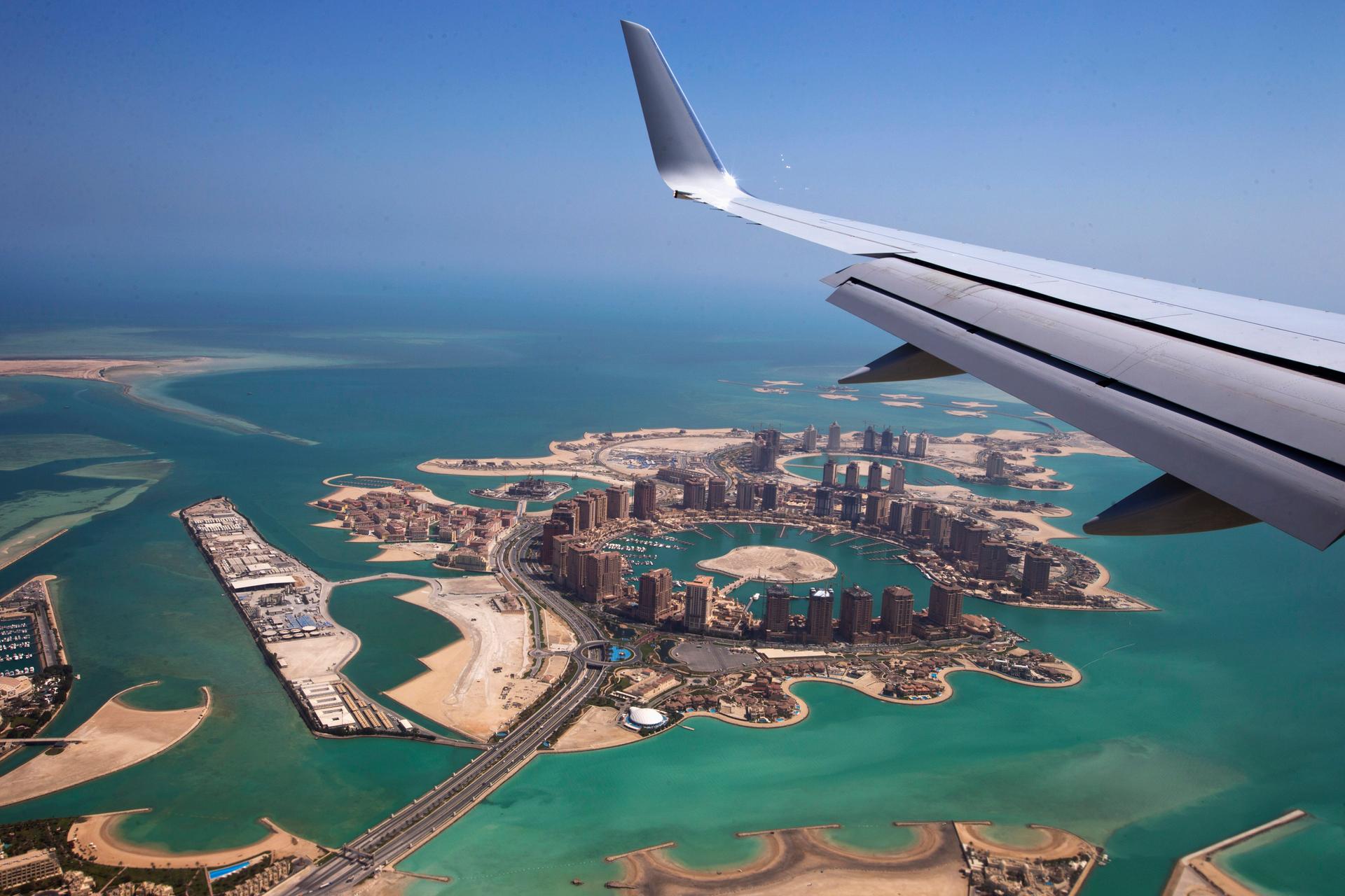 Airplane overlooking Doha.