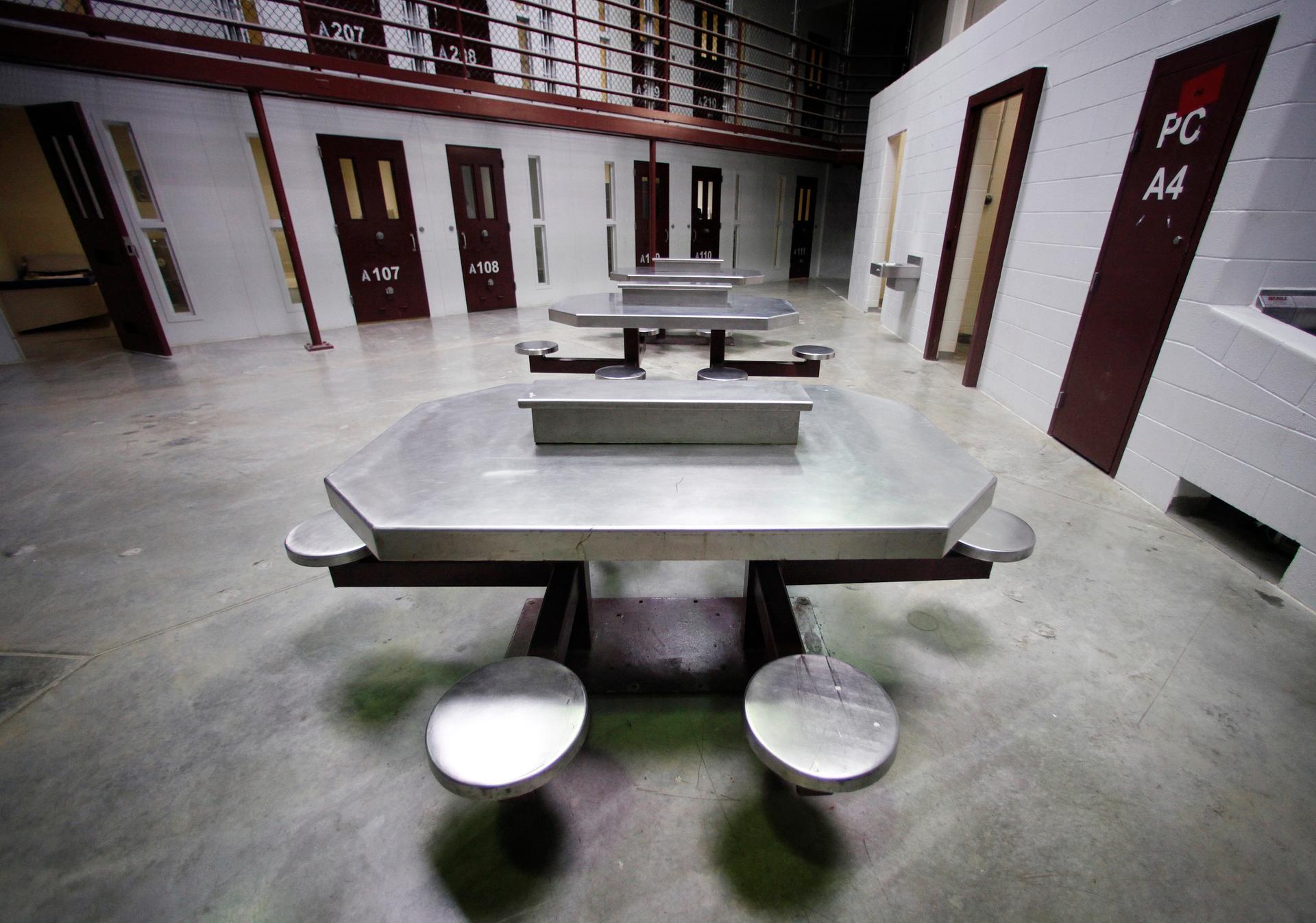 The interior of an unoccupied communal cellblock is seen at Camp VI, a prison used to house detainees at the U.S. Naval Base at Guantanamo Bay, March 5, 2013.