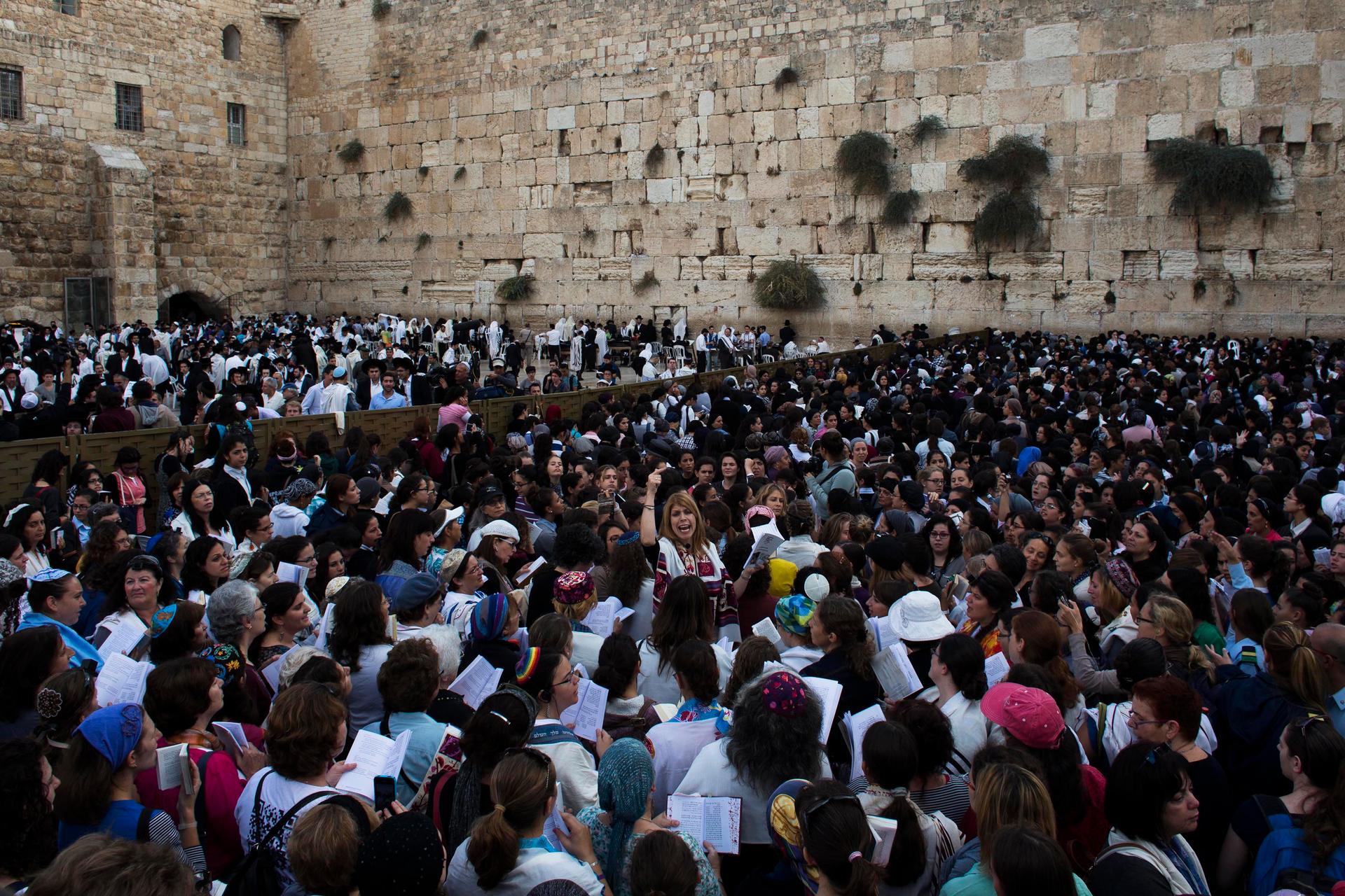 Members of the Women of the Wall group take part in their monthly prayer session at the Western Wall in Jerusalem's Old City.
