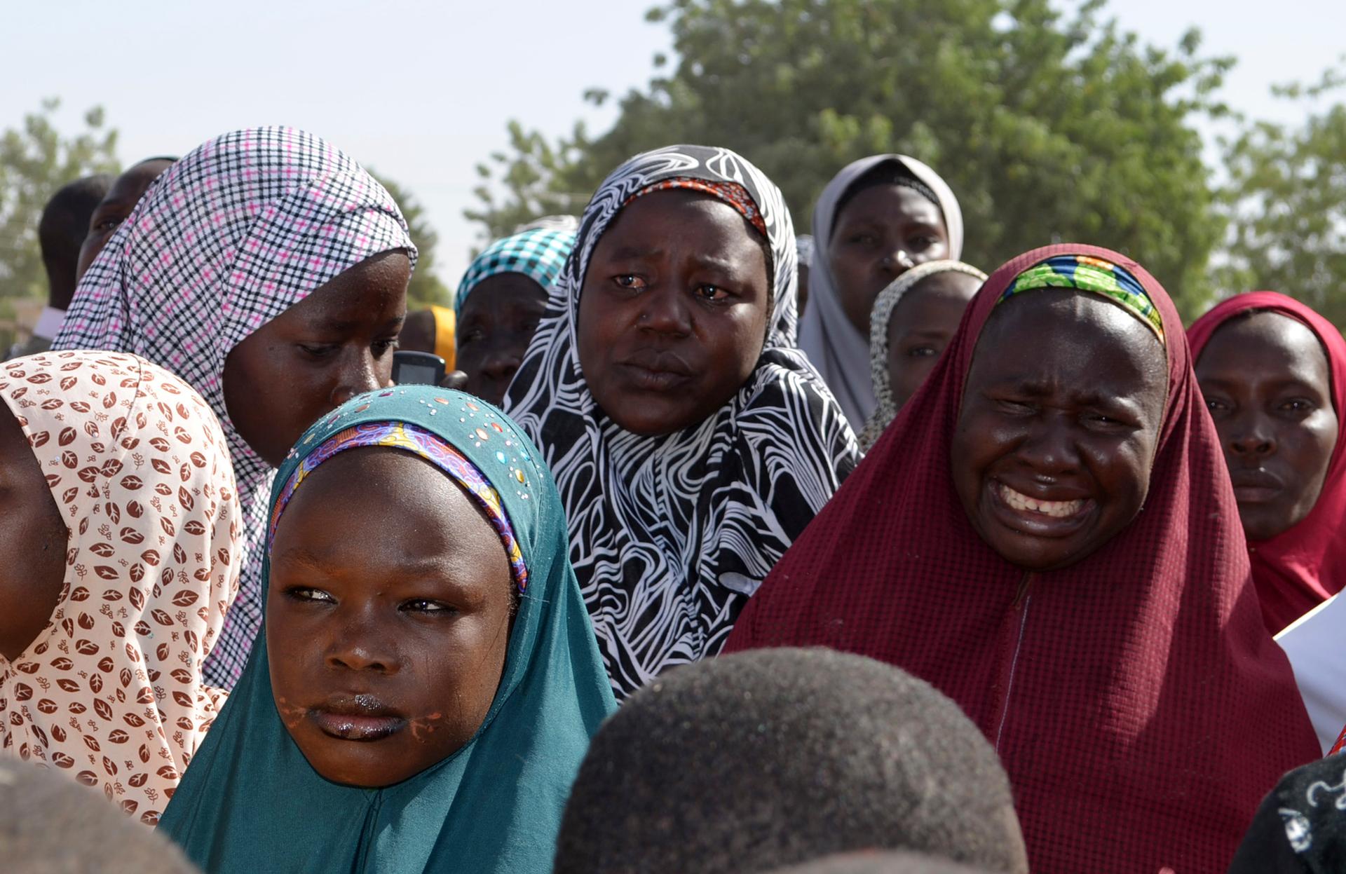 Parents of the Nigerian girls abducted by Islamist militants from the village of Chibok , grieve for their daughters