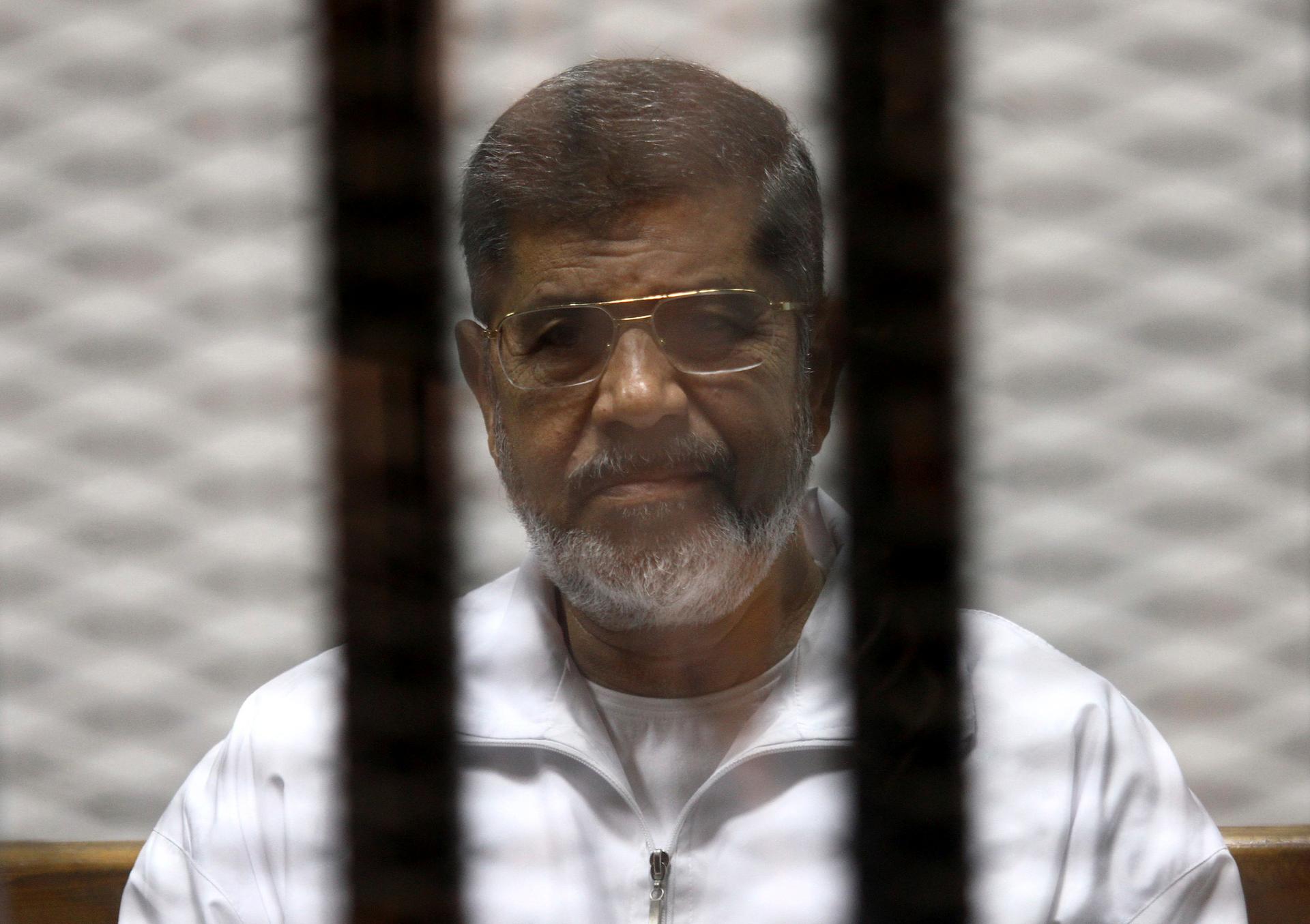 Ousted Egyptian President Mohammed Morsi during his trial at a Cairo court on May 8, 2014. He has been sentenced to 20 years in prison.