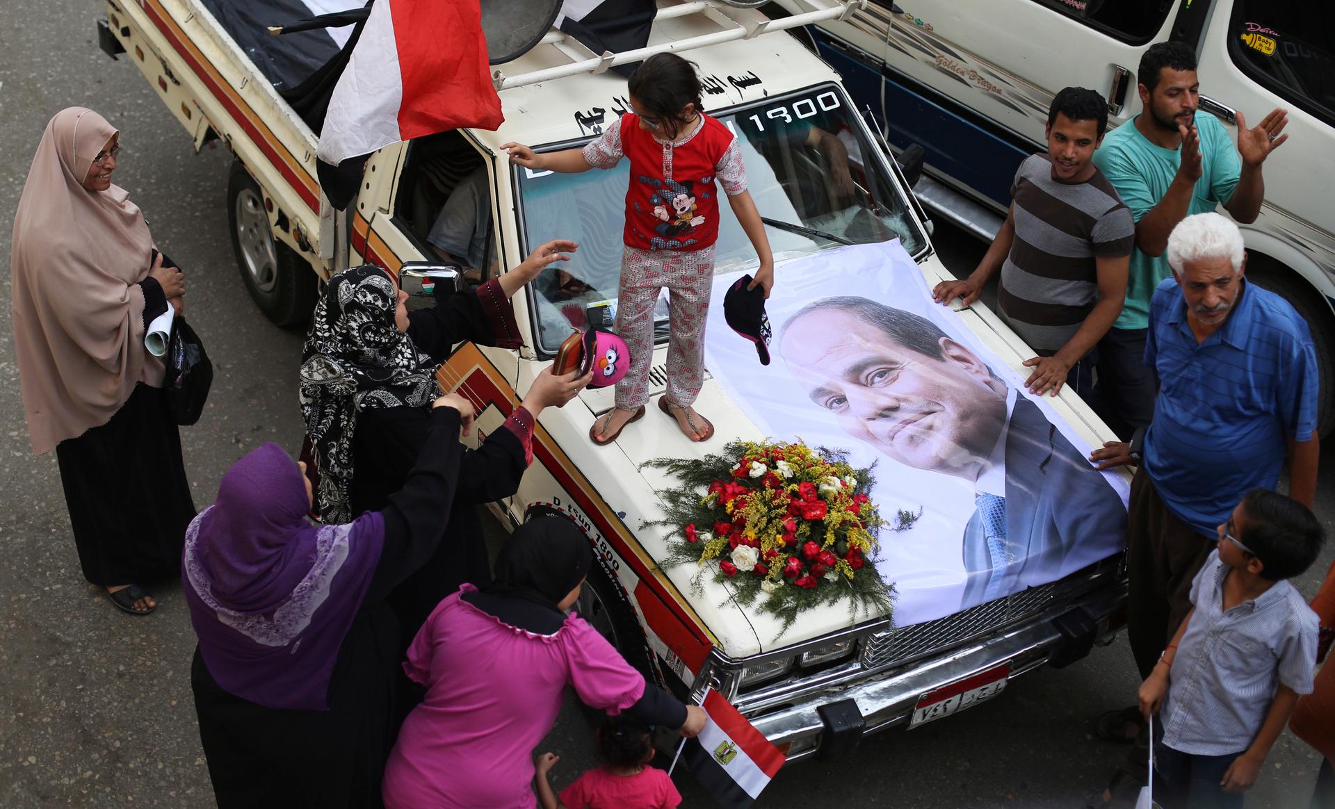 Egypt's government is determined to get more voters to the polls after a lower than expected turnout in a presidential election threatened to undermine the credibility of the frontrunner, former army chief Abdel Fattah al-Sisi.