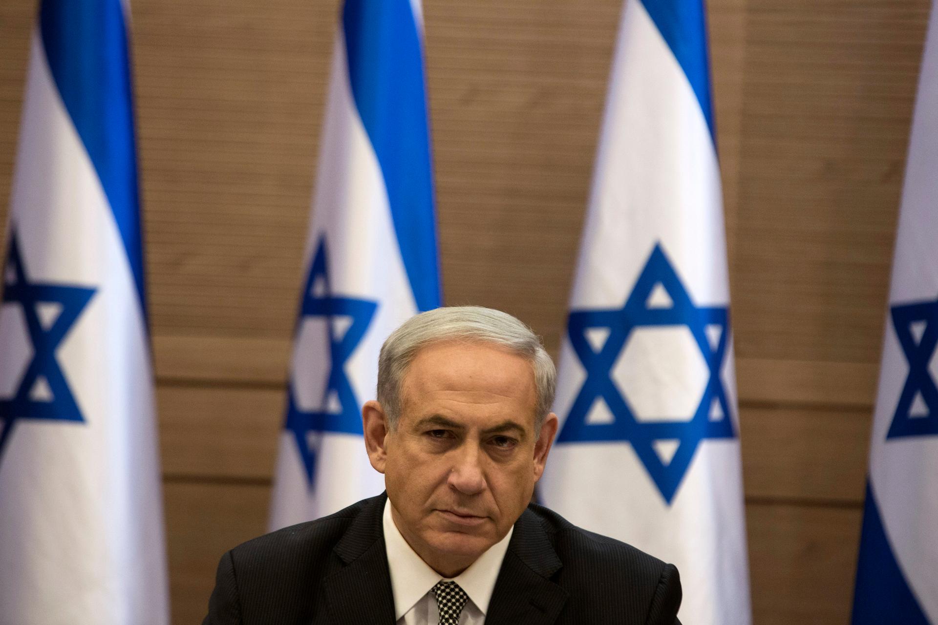 Israel's Prime Minister Benjamin Netanyahu heads a cabinet meeting in Jerusalem, Thursday. So far, his government has enjoyed the support of the Israeli people in the conflict with Hamas.