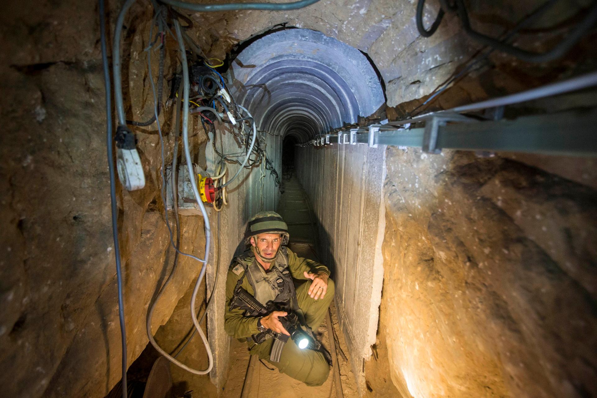 An Israeli army officer during an army-organized tour in a tunnel said to be used by Palestinian militants for cross-border attacks.