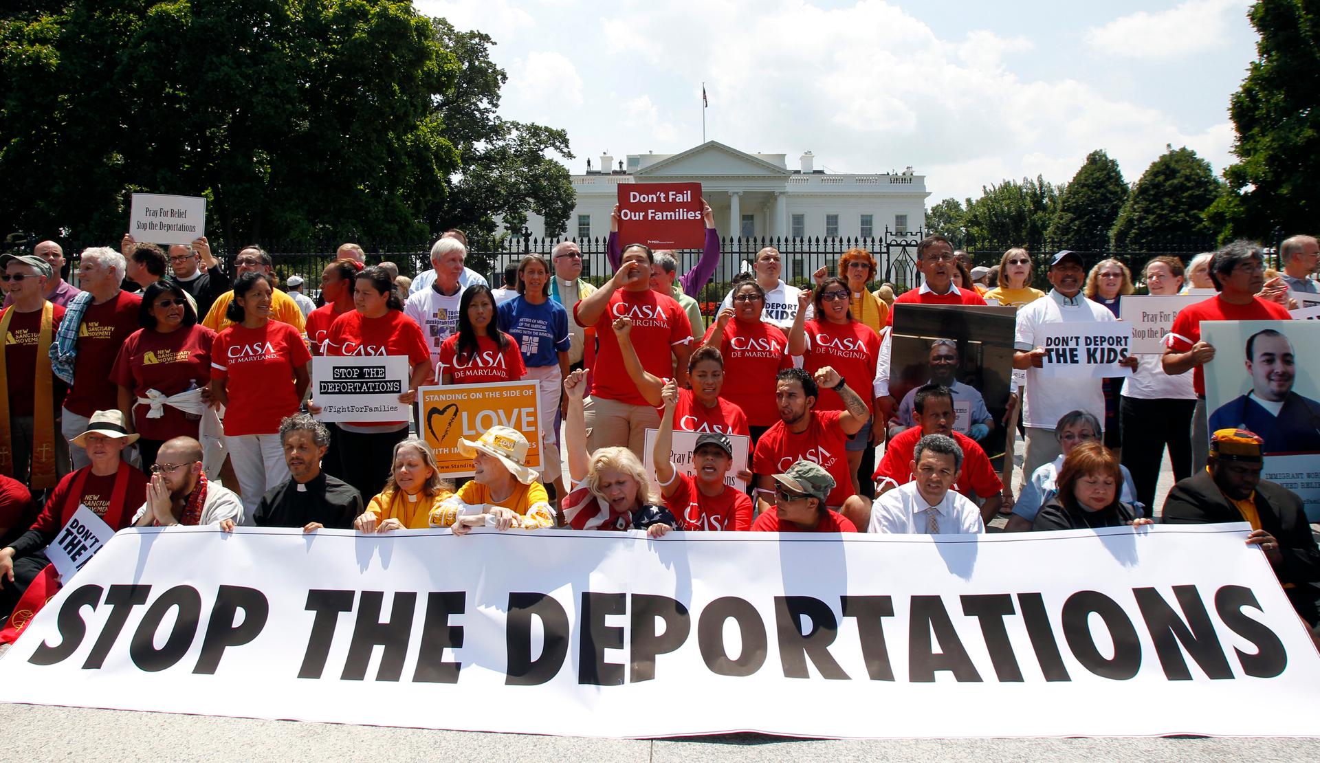 Church groups take part in a protest against President Barack Obama's immigration enforcement policies outside the White House in Washington July 31, 2014. The White House has indicated it will announce a plan to prevent an estimates 5 million from being 