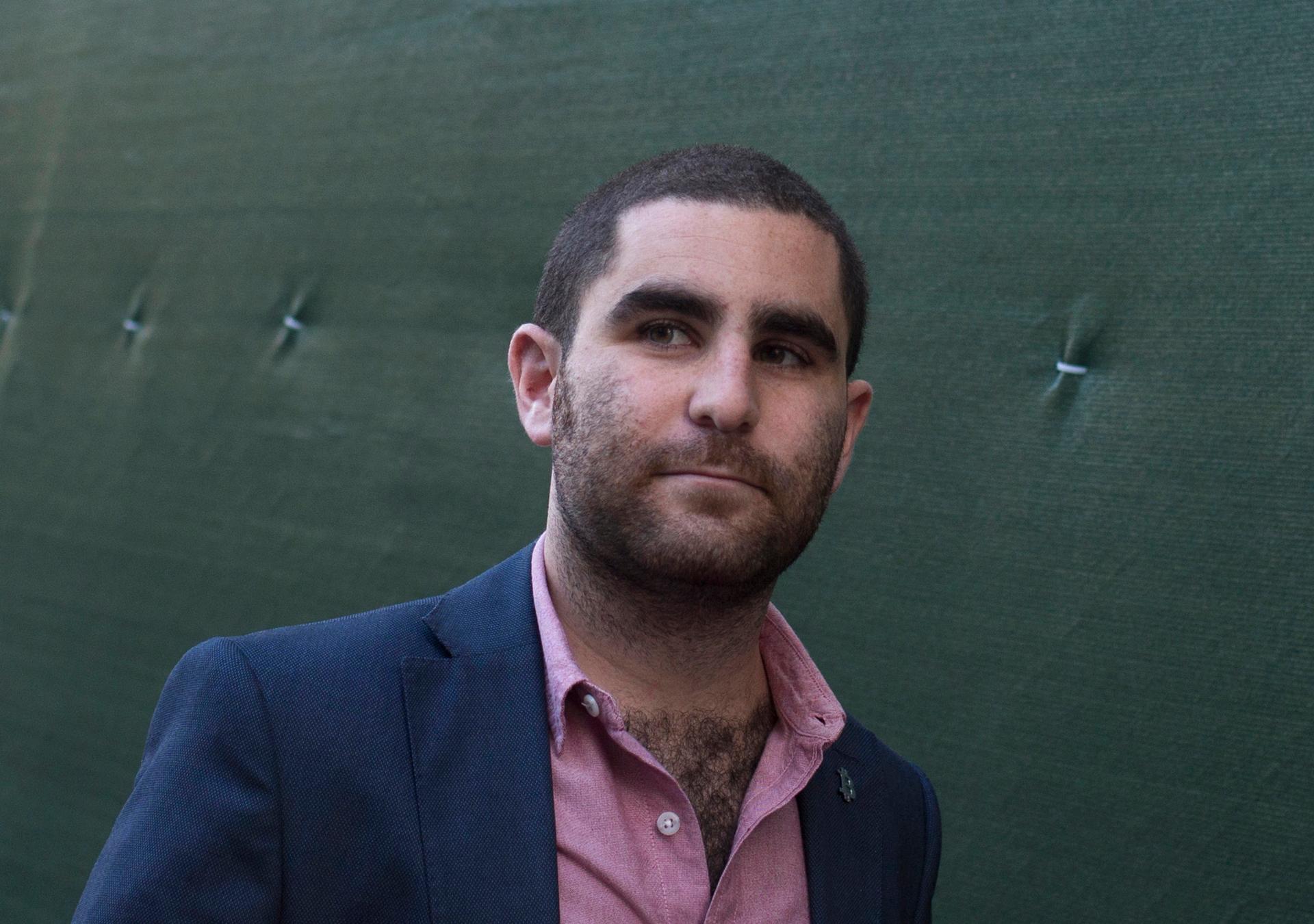 Bitcoin promoter Charlie Shrem walks out of federal court in Lower Manhattan on September 4, 2014. A judge later sentenced Shrem to two years in prison for aiding illegal transactions.