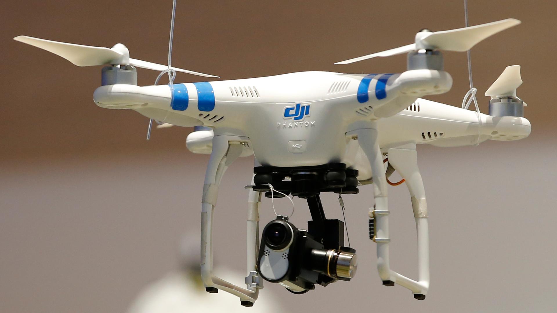 A drone with Sony Action Cam Mini is pictured at the IFA consumer technology fair in Berlin, September 5, 2014.