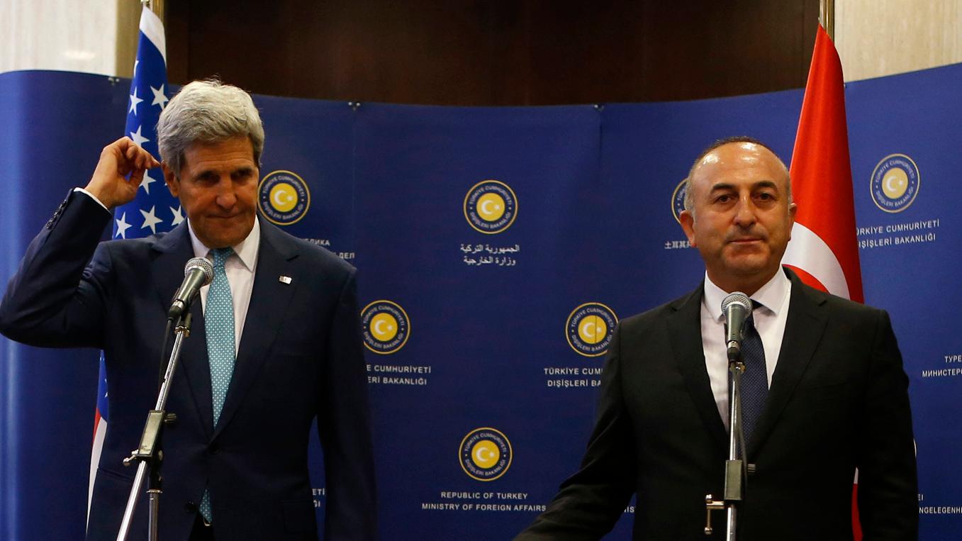 Secretary of State John Kerry and Turkey's Foreign Minister Mevlut Cavusoglu talk to the media before a meeting in Ankara. The United States is not getting all it wants from Turkey in the fight against the Islamic State.