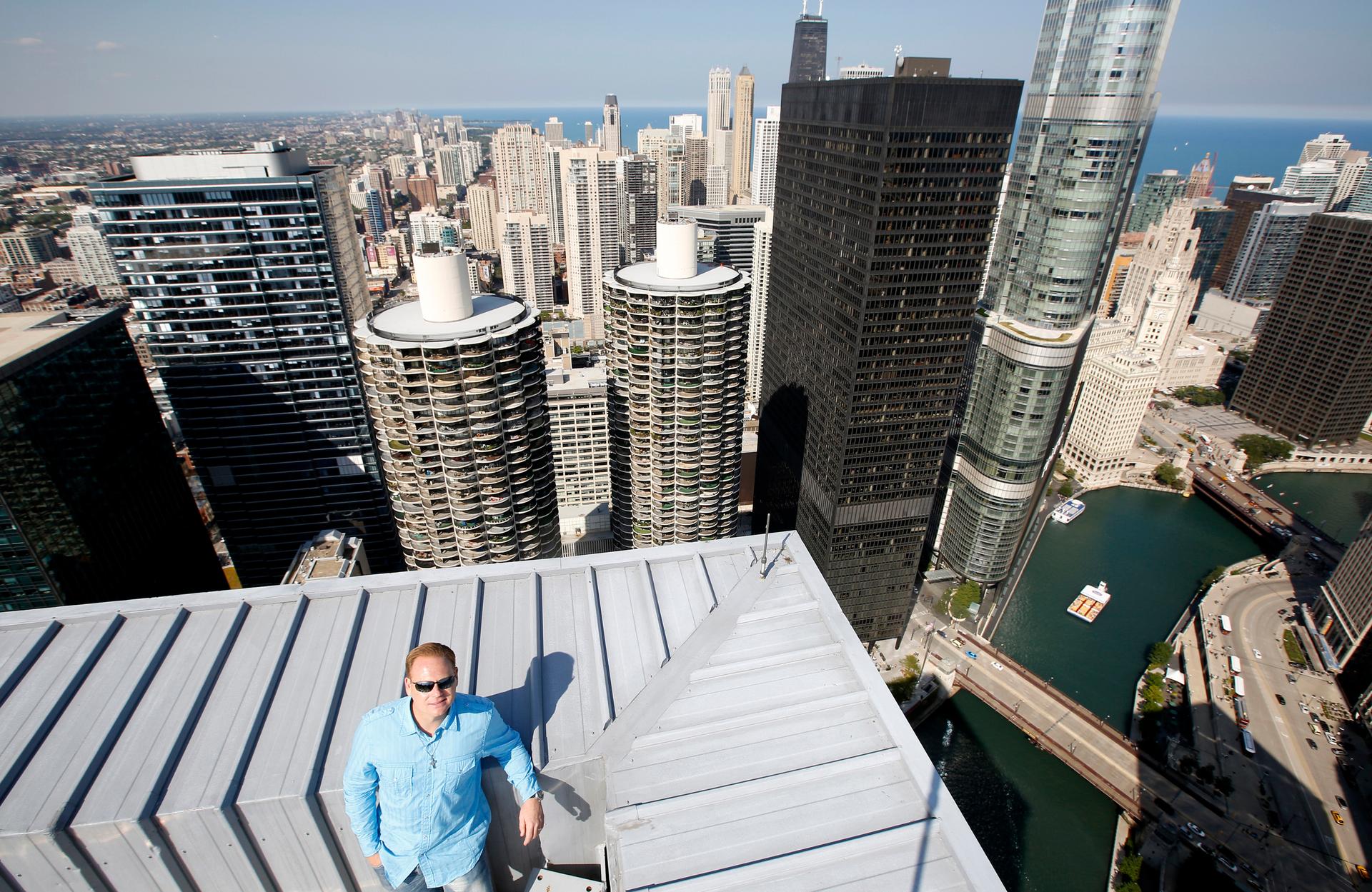 Daredevil Nik Wallenda poses for a photo on the rooftop of the Leo Burnett Building in Chicago on September 17, 2014.