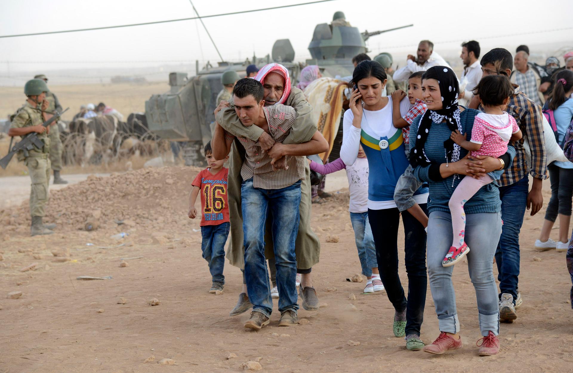 Syrian Kurds flee into Turkey this past weekend to escape attacks from Islamic State militants. Around 130,000 Kurds were given shelter inside of Turkey.