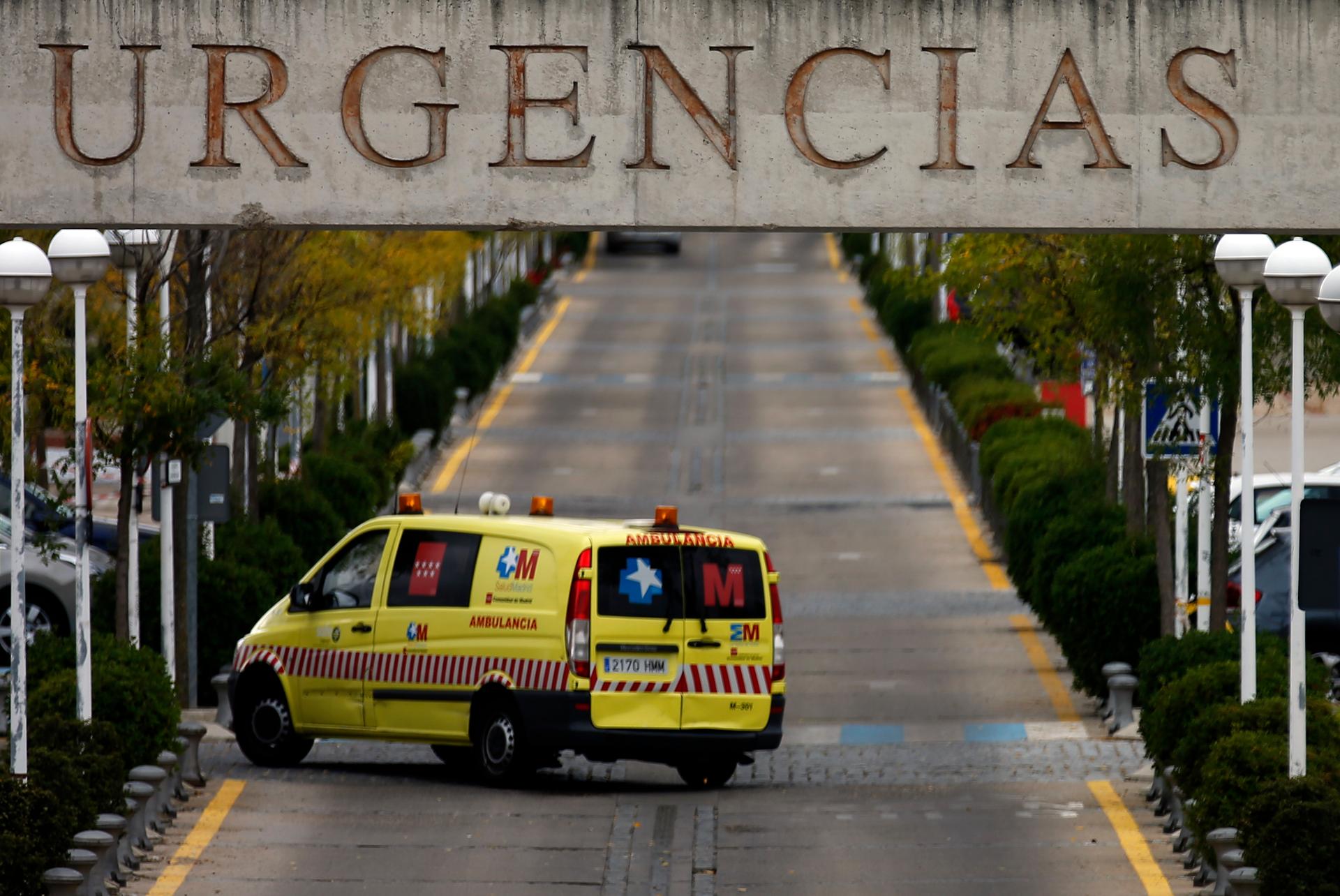 An ambulance enters the emergency area at the Alcorcón hospital outside Madrid. The Spanish nurse who contracted Ebola while treating infected patients is currently in isolation at the facility.