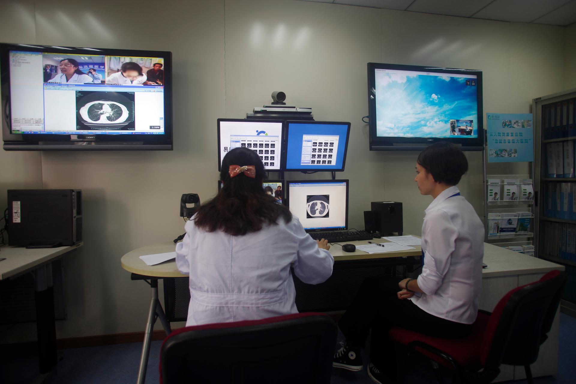 Doctors diagnose a patient remotely at the First Hospital of Zhejiang Province