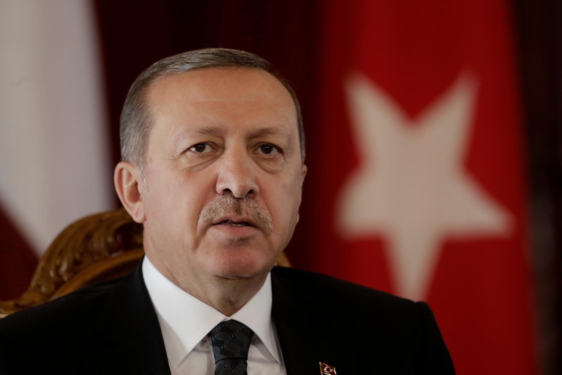 Turkey's president, Recep Tayyip Erdogan, speaks during a news conference in Riga, Latvia, on October 23, 2014. 