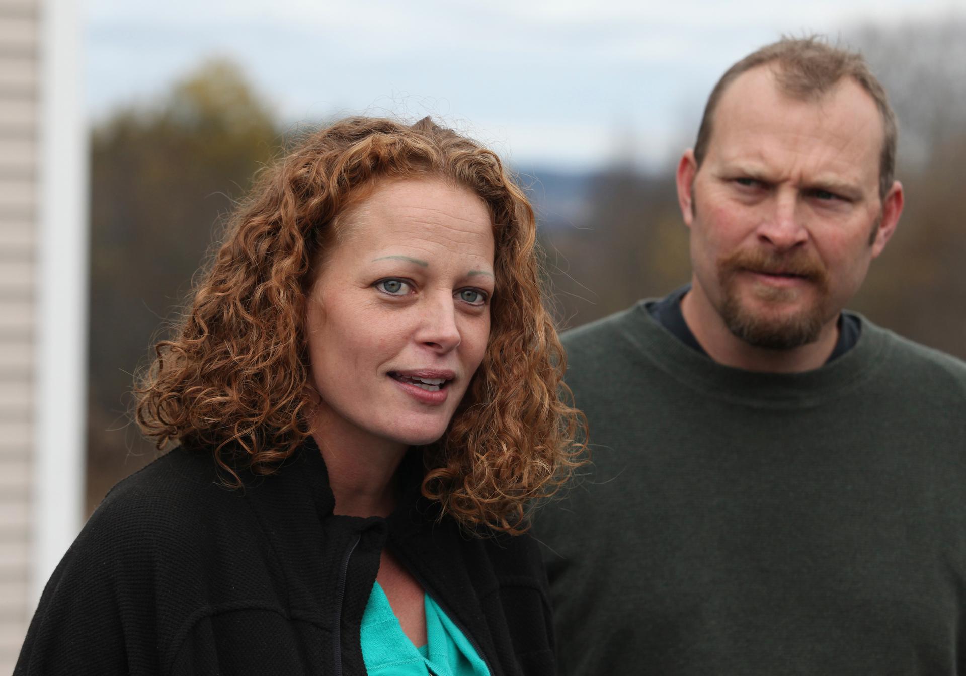Nurse Kaci Hickox and her boyfriend, Ted Wilbur, speak with the media outside of their home in Fort Kent, Maine, on October 31, 2014. Hickox defied quarantine orders in New Jersey and Maine after returning from West Africa but testing negative for Ebola.