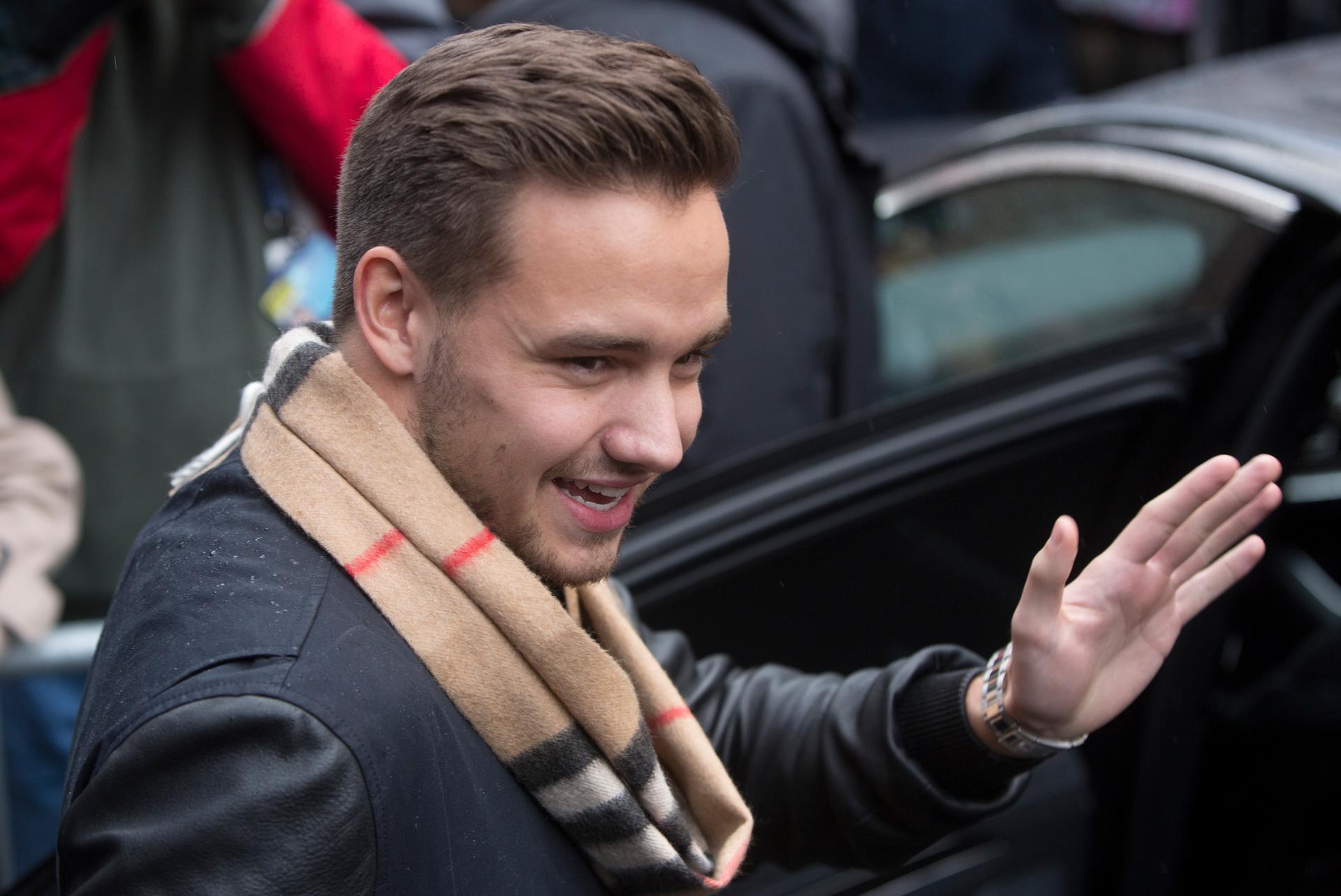 Liam Payne, singer with British boy band One Direction, leaves the recording of the Band Aid 30 charity single in London on November 15, 2014.