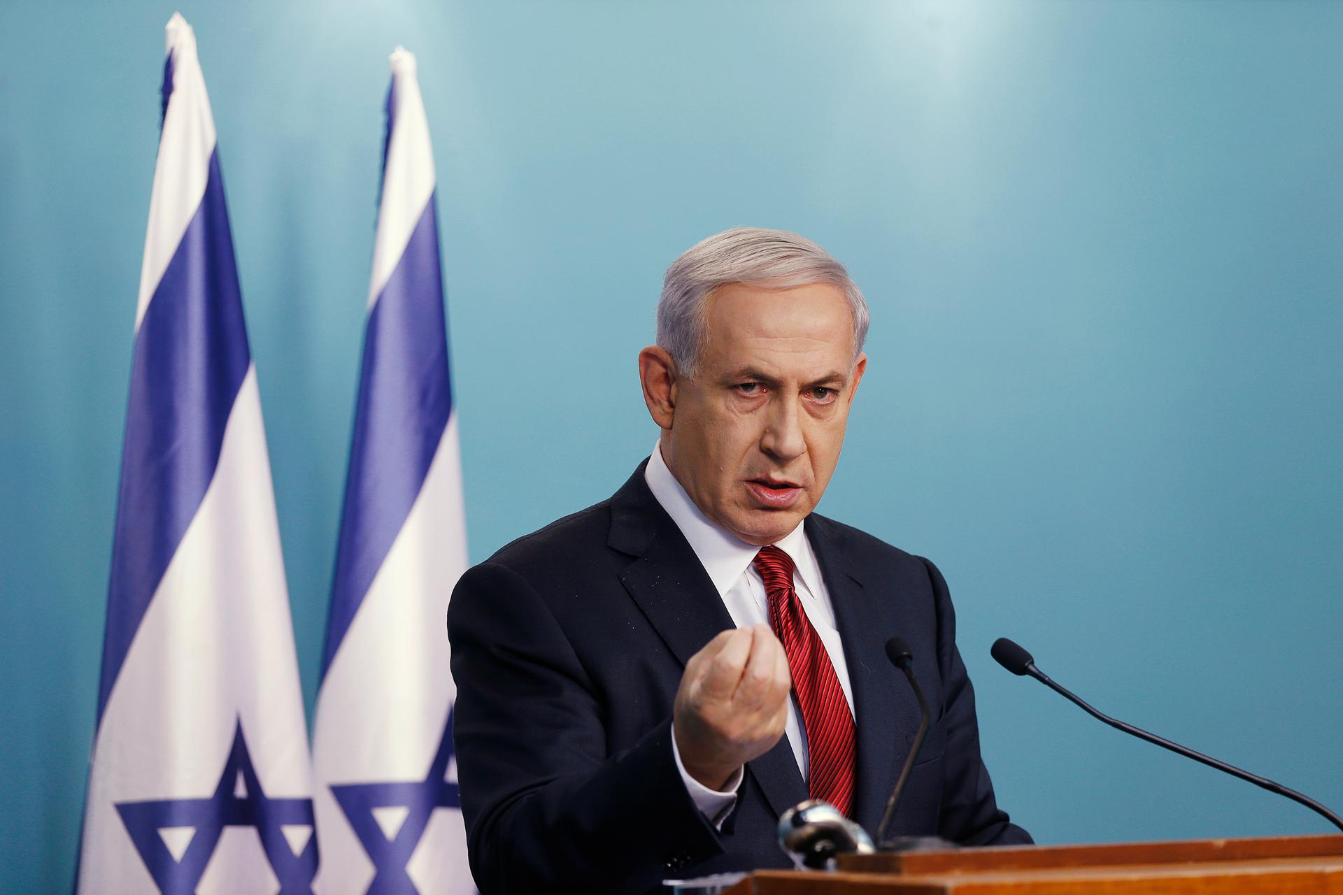 Israel's Prime Minister Benjamin Netanyahu delivers a statement to the media in Jerusalem following a terrorist attack on a West Jerusalem synagogue on November 18, 2014. 